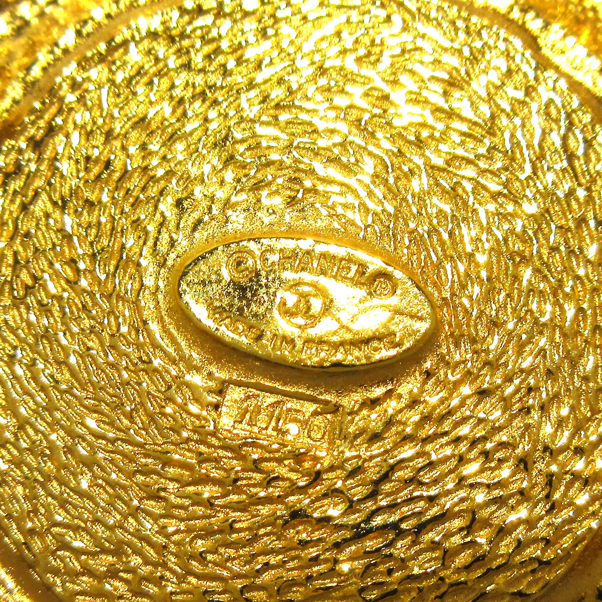 Broche con herrajes dorados CC USADO