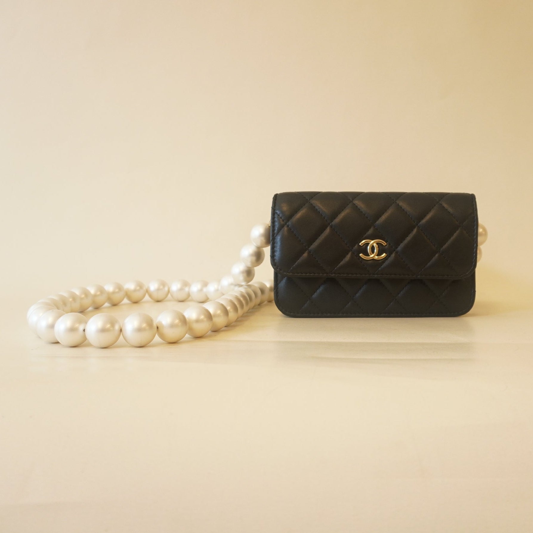 PRE-OWNED CC Black Calfskin Quilted Maxi Pearls Clutch With Chain
