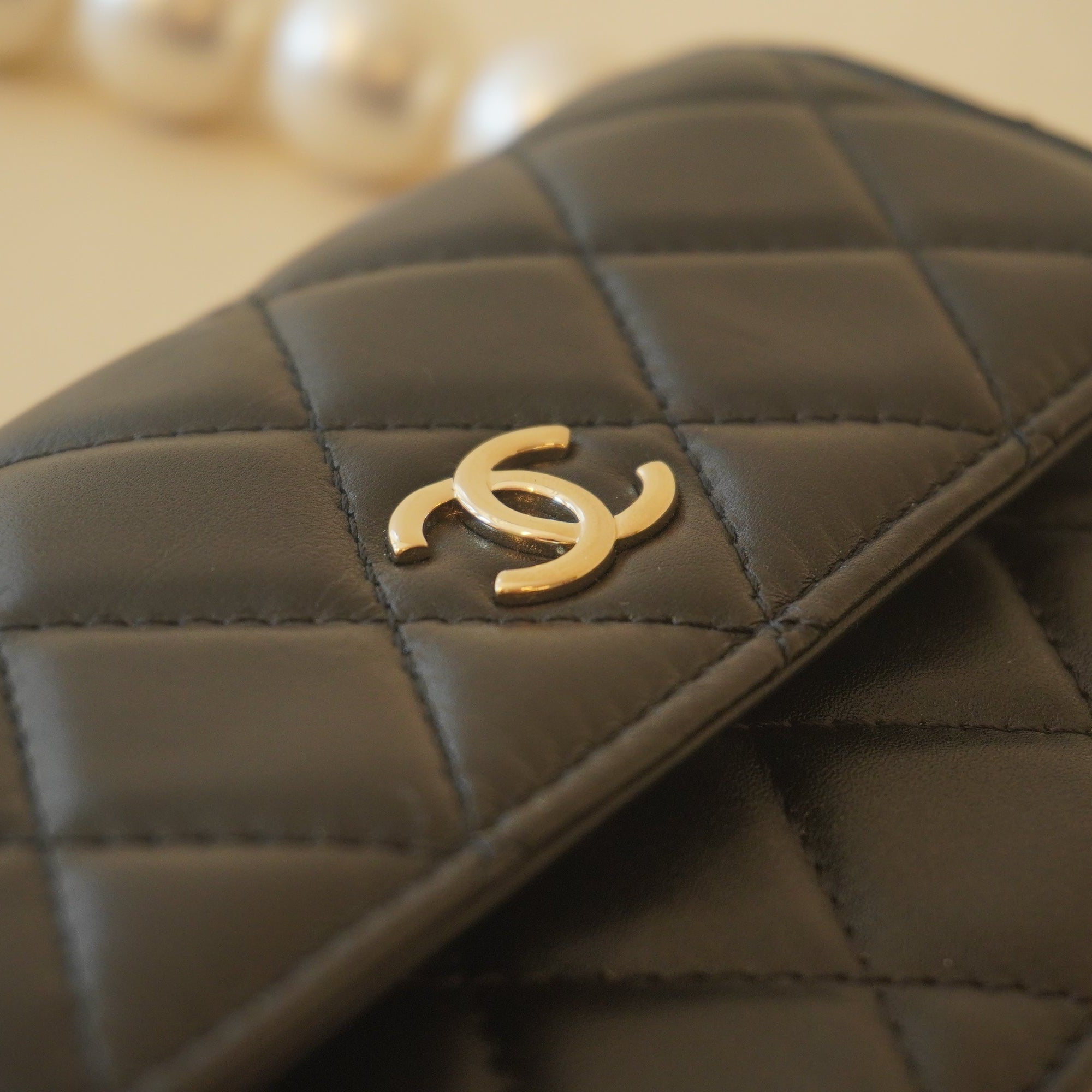 PRE-OWNED CC Black Calfskin Quilted Maxi Pearls Clutch With Chain