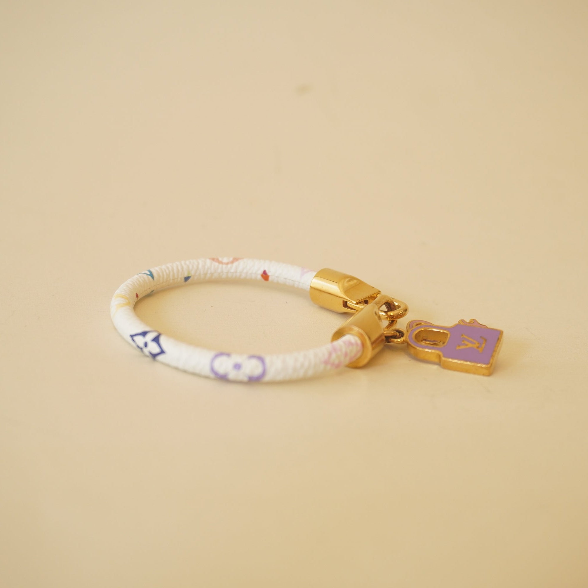 PRE-OWNED LV White Monogram Multicolore Luck It Bracelet