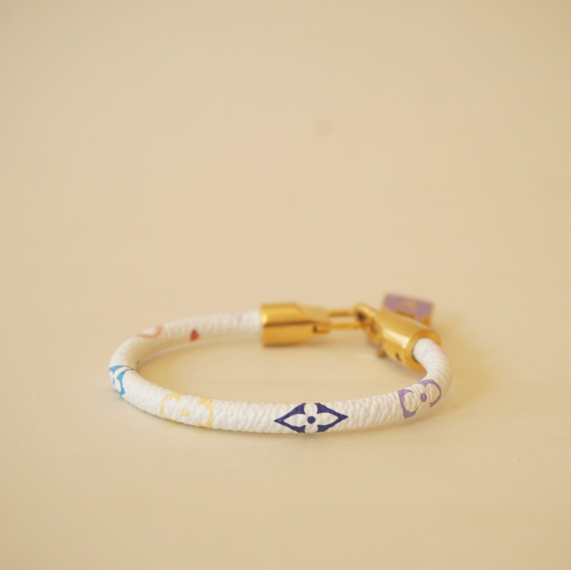 PRE-OWNED LV White Monogram Multicolore Luck It Bracelet