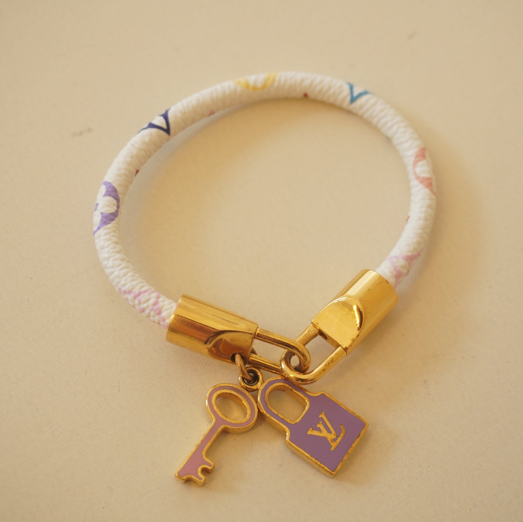 PRE-OWNED LV White Monogram Multicolore Luck It Bracelet