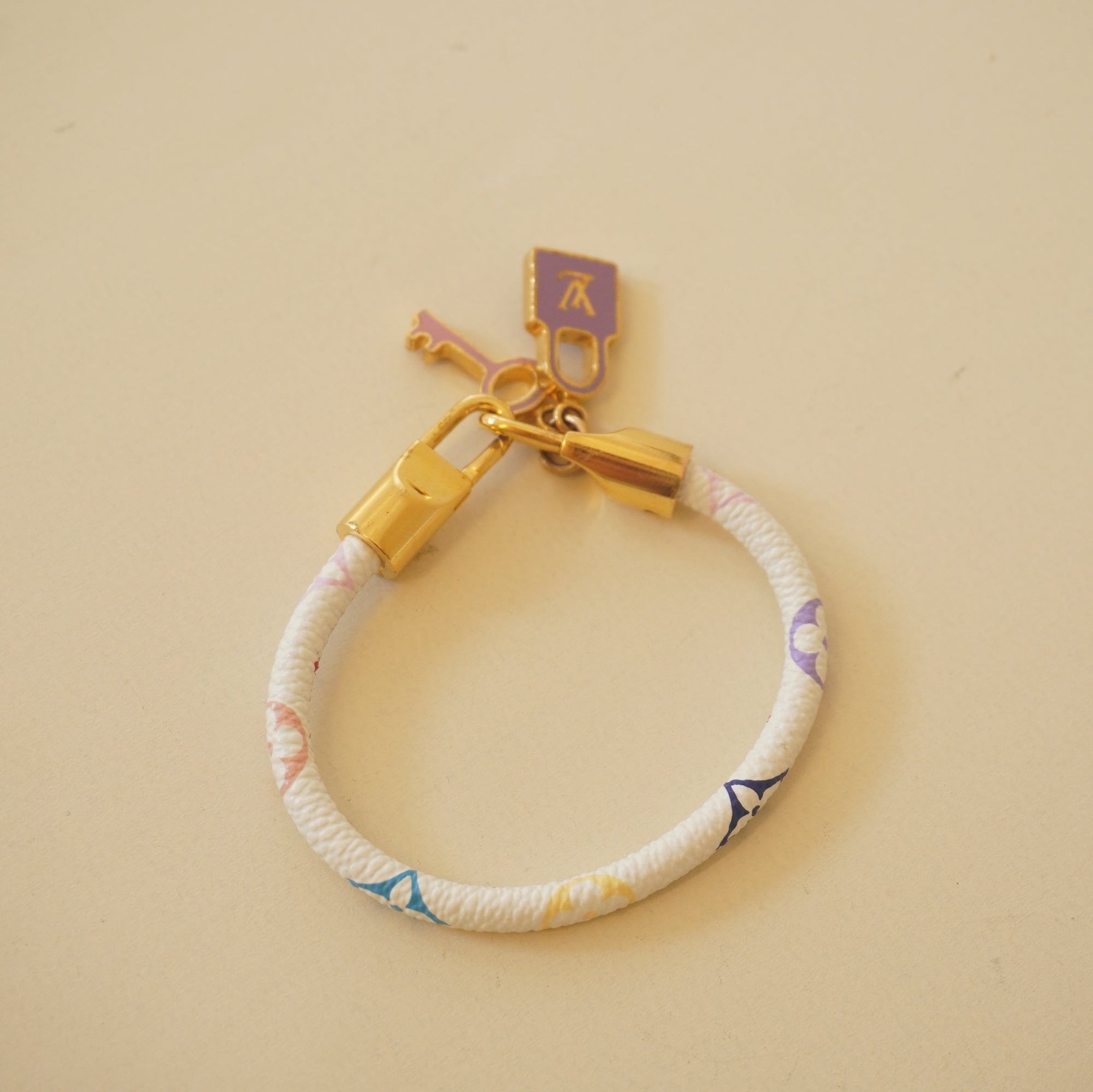 PRE-OWNED LV White Monogram Multicolore Luck It Bracelet