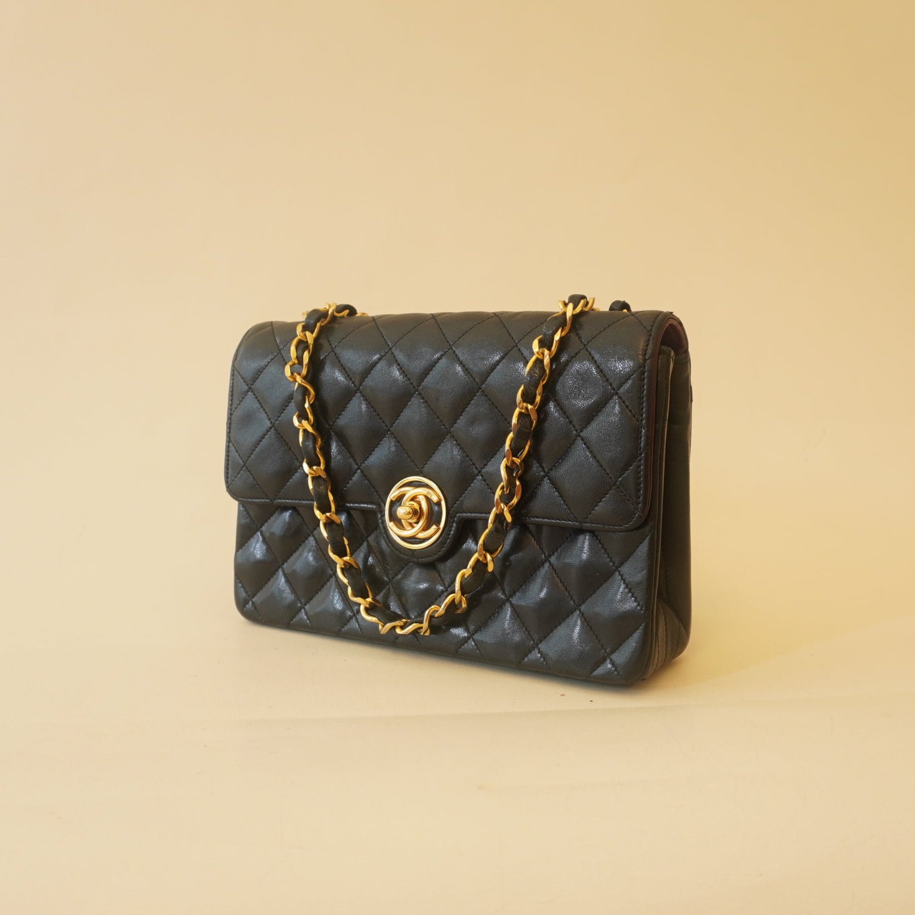 PRE-OWNED CC Black Mini Matelasse Vintage Turn Lock Shoulder Bag