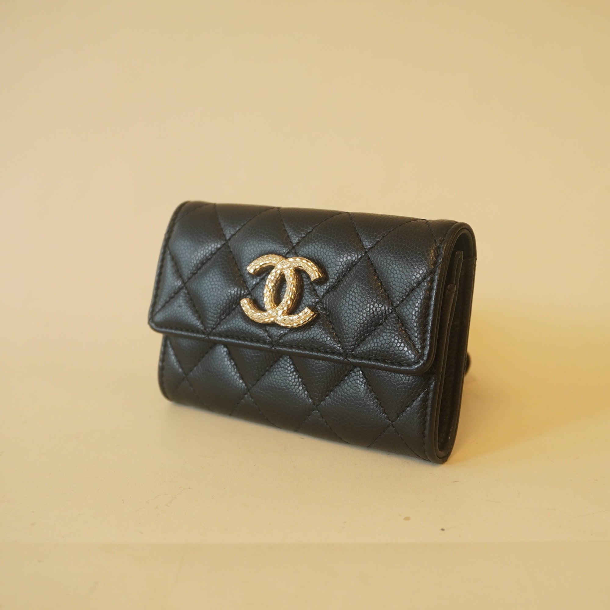 PRE-OWNED Caviar Metal Perforated Quilted CC Flap Card Holder Black