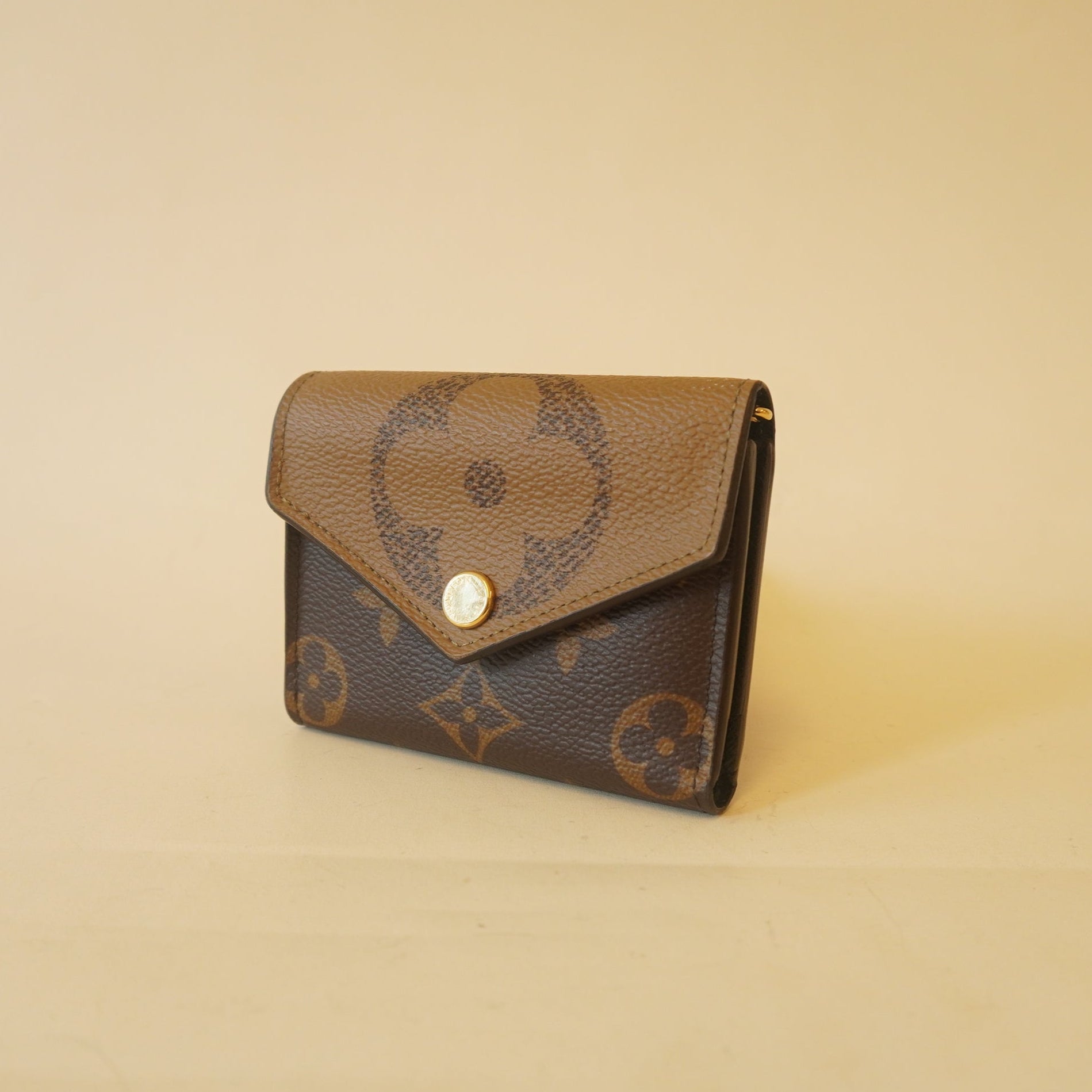 PRE-OWNED Reverse Monogram Giant Zoe Wallet