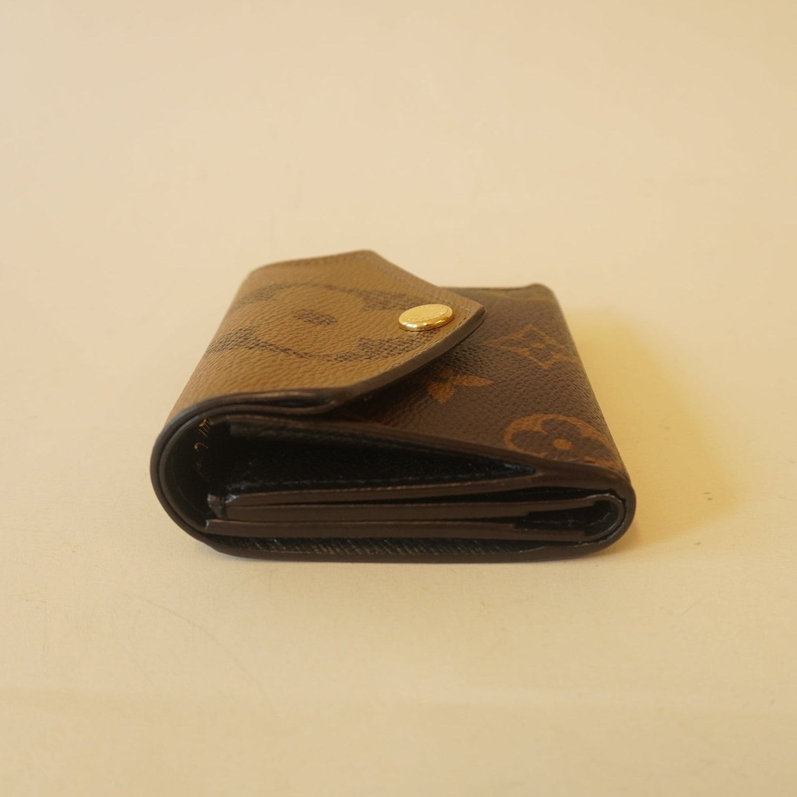 PRE-OWNED Reverse Monogram Giant Zoe Wallet