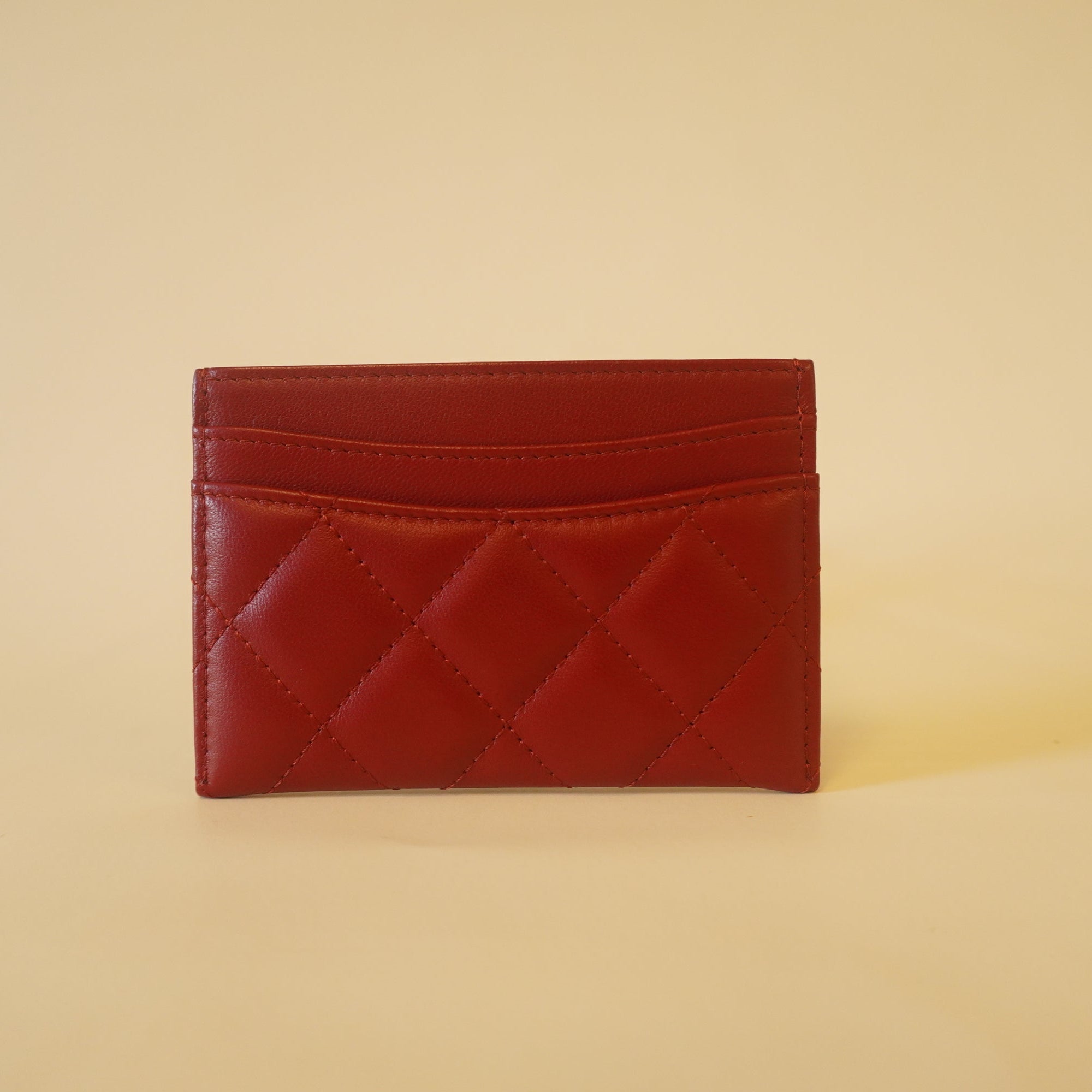 PRE-OWNED Lambskin Quilted Card Holder Red