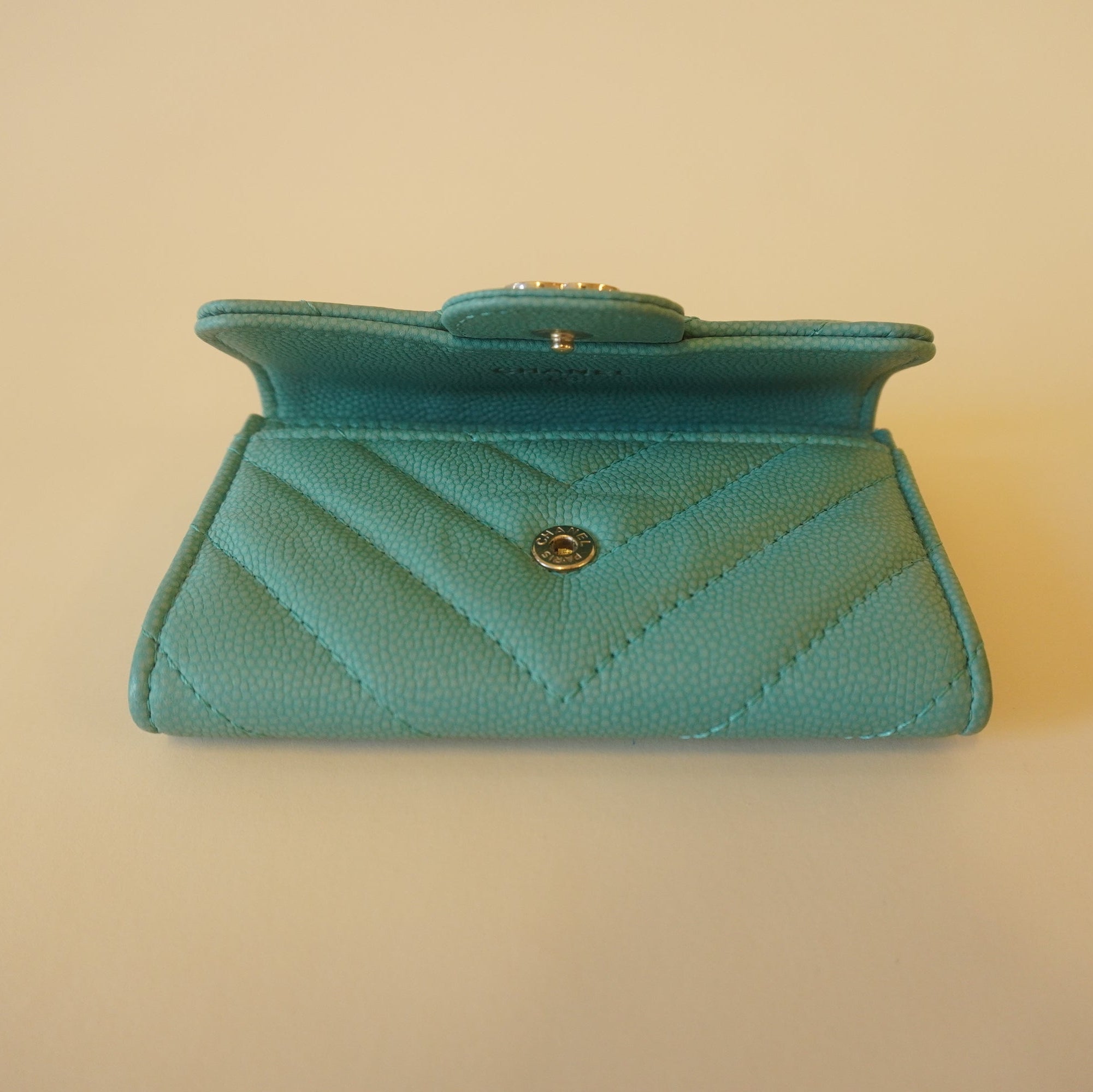 PRE-OWNED CC Acqua Caviar Chevron Quilted Card Holder Wallet