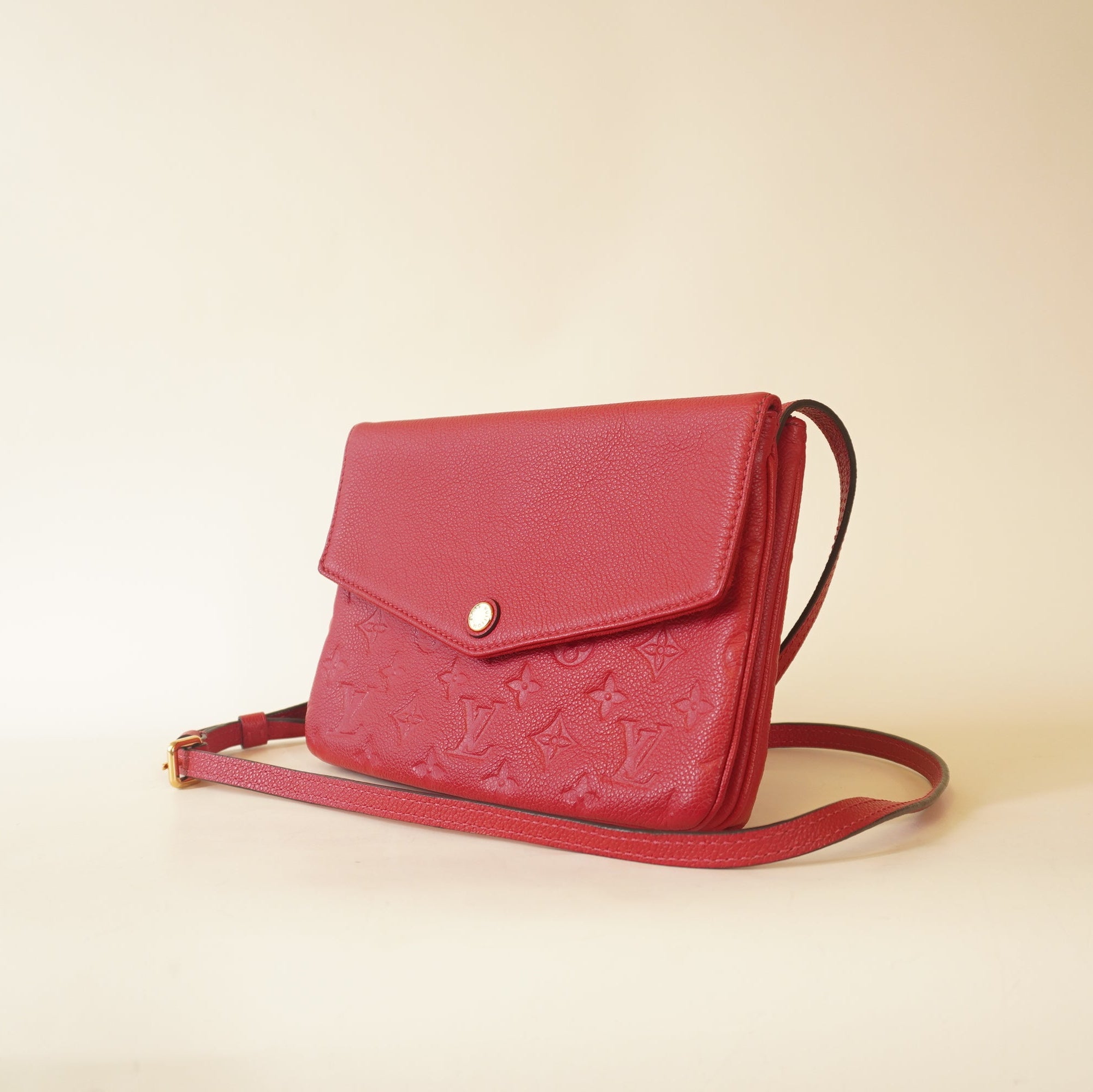 PRE-OWNED LV Raspberry Monogram Empreinte Leather Twice Shoulder Bag