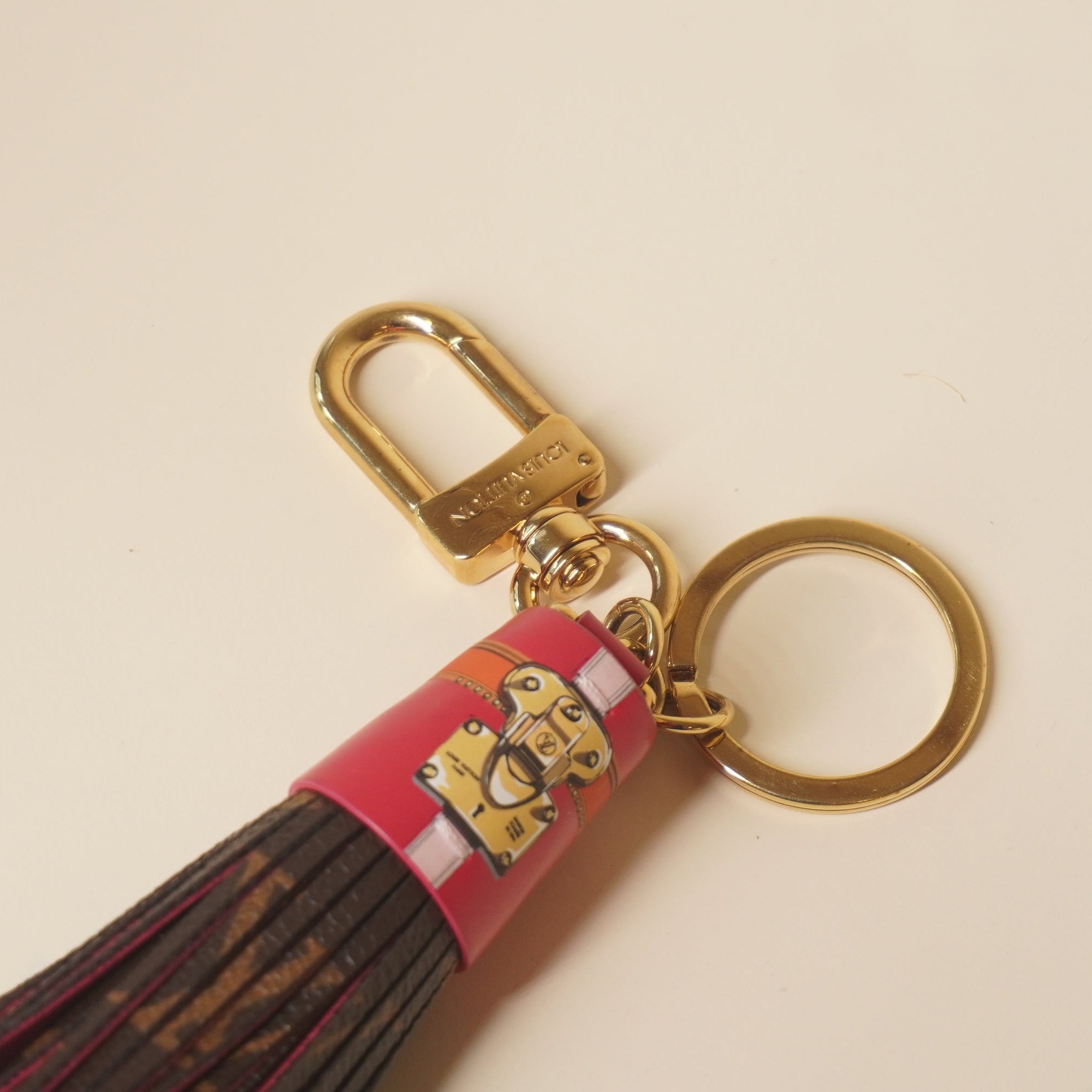 PRE-OWNED LV Monogram Red Canvas Tassel Bag Charm