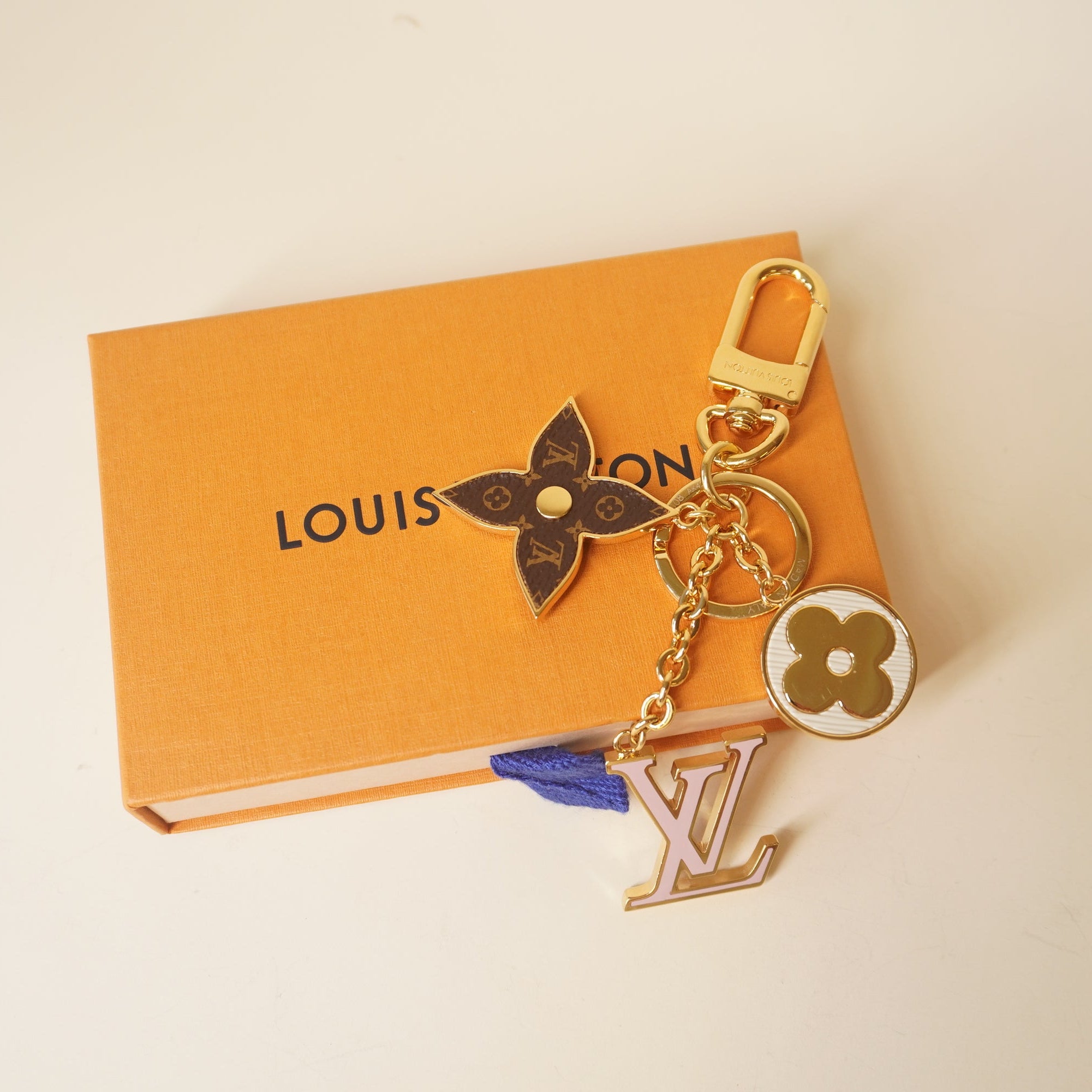 PRE-OWNED LV Metal Monogram Epi Spring Street Bag Charm Key Holder