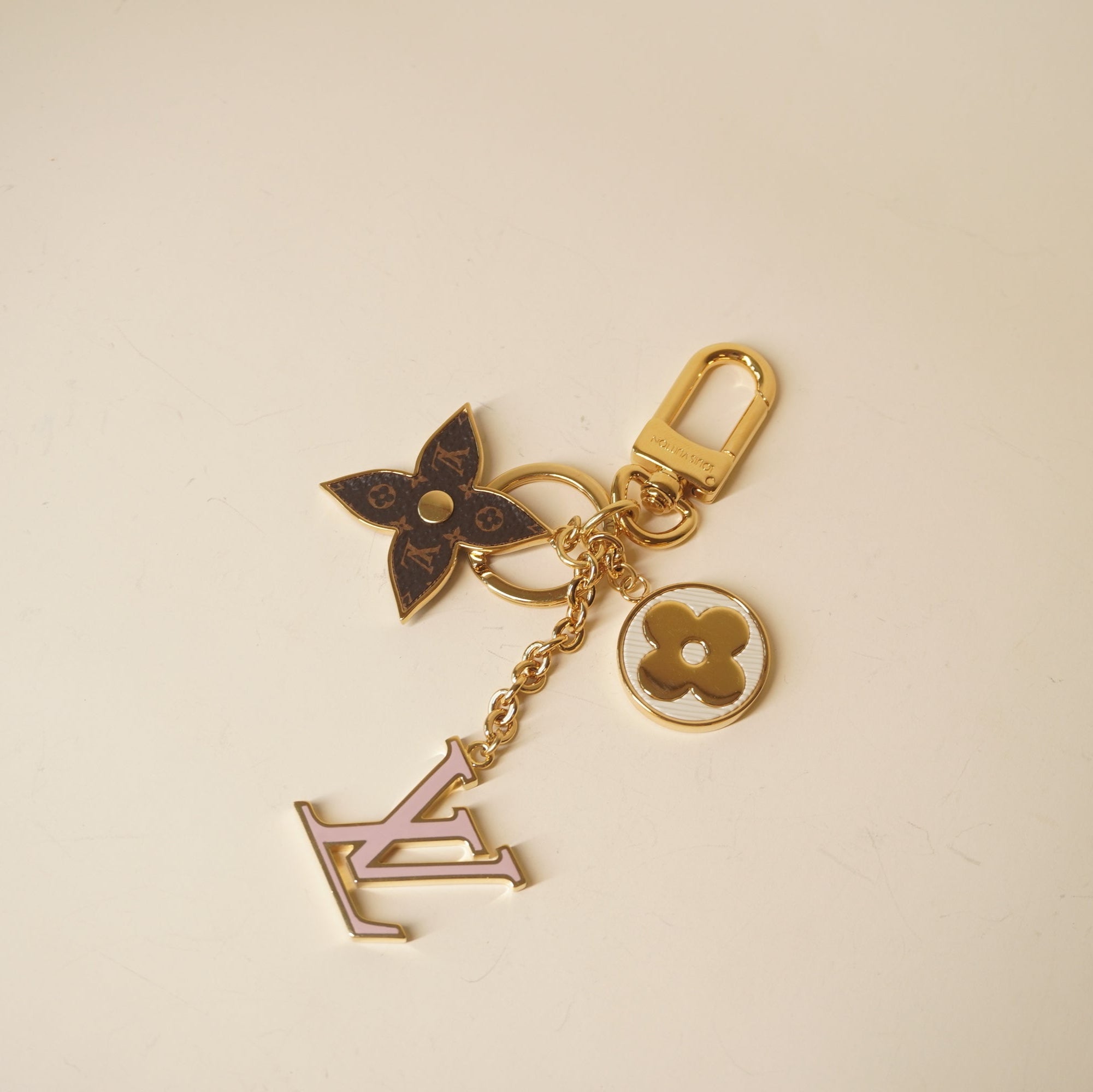 PRE-OWNED LV Metal Monogram Epi Spring Street Bag Charm Key Holder