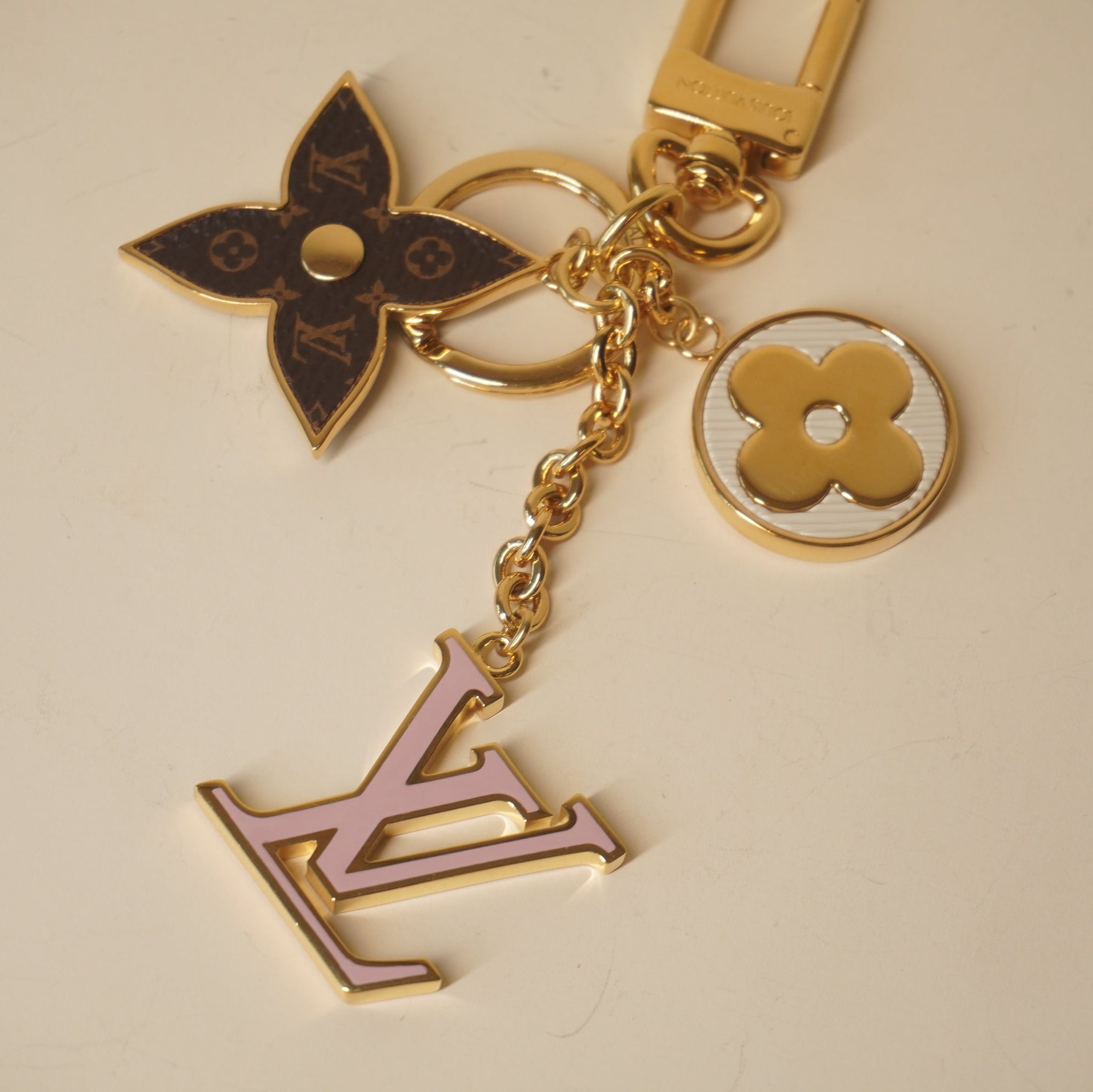 PRE-OWNED LV Metal Monogram Epi Spring Street Bag Charm Key Holder