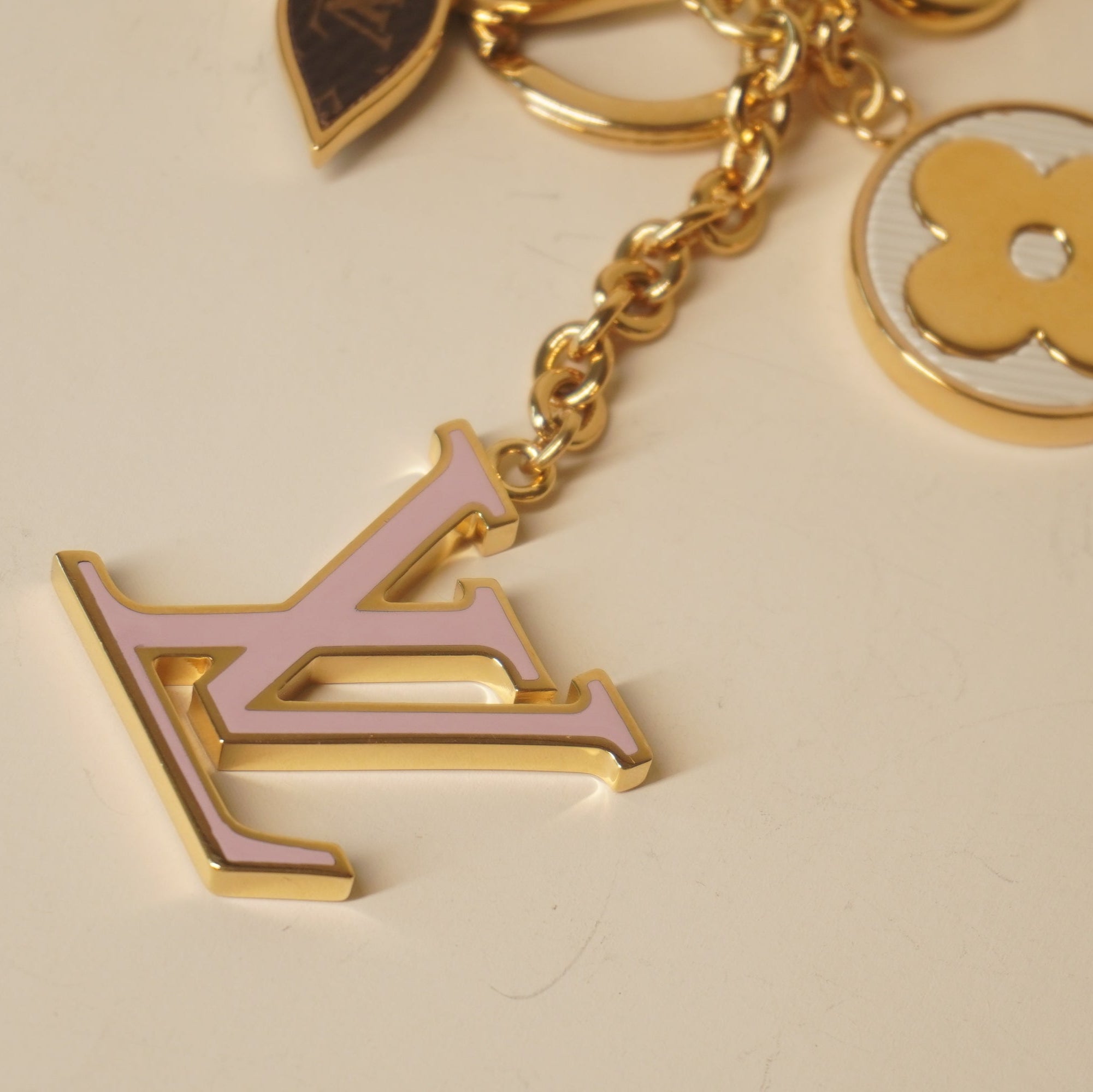 PRE-OWNED LV Metal Monogram Epi Spring Street Bag Charm Key Holder