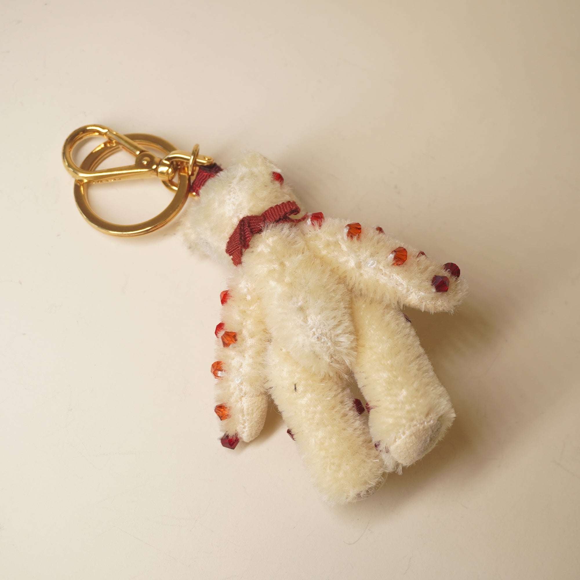 PRE-OWNED Teddy Bear Cupid with Rubies Bag Charm