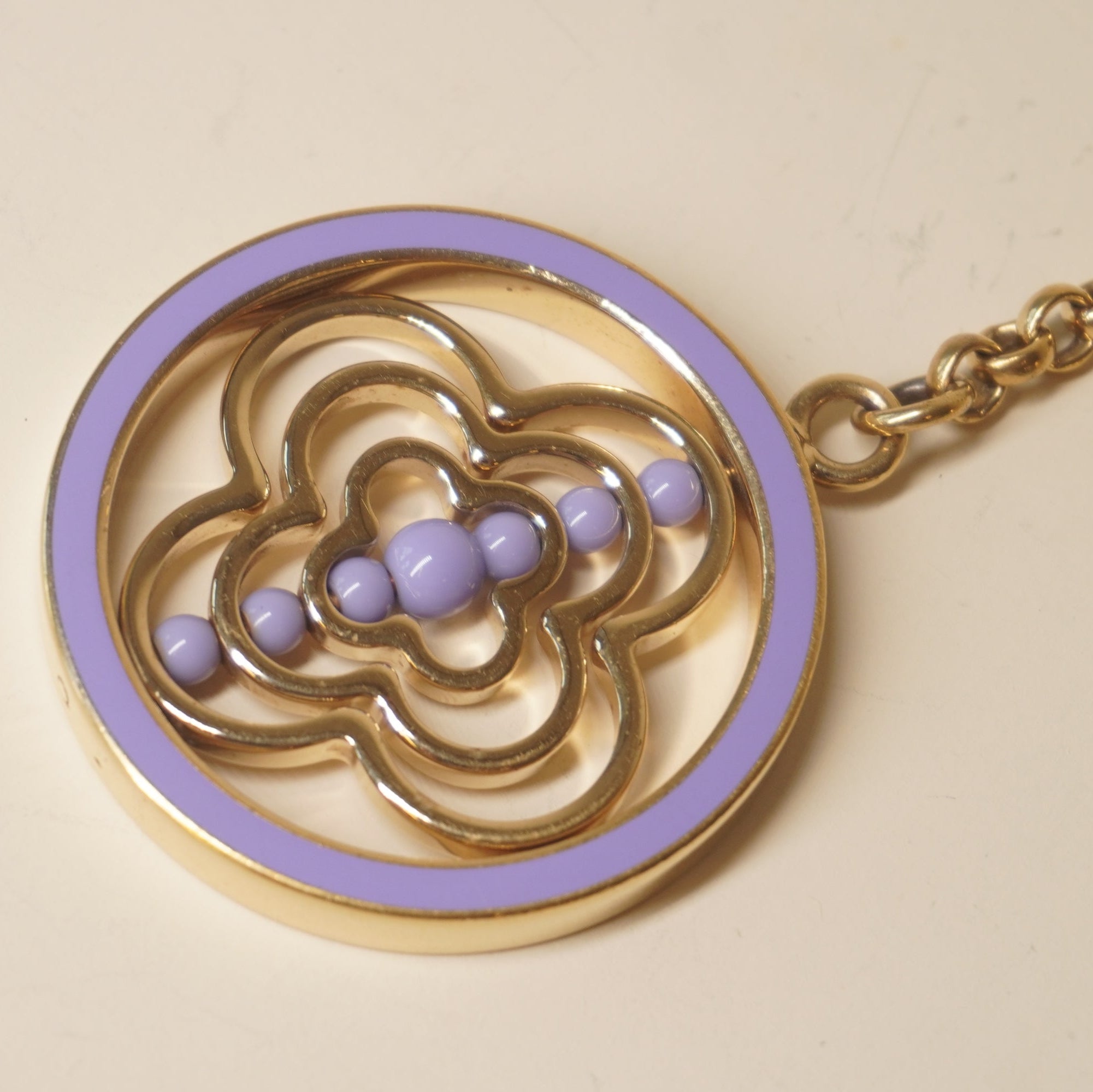 PRE-OWNED LV Whirly Flower Bag Charm Lilac