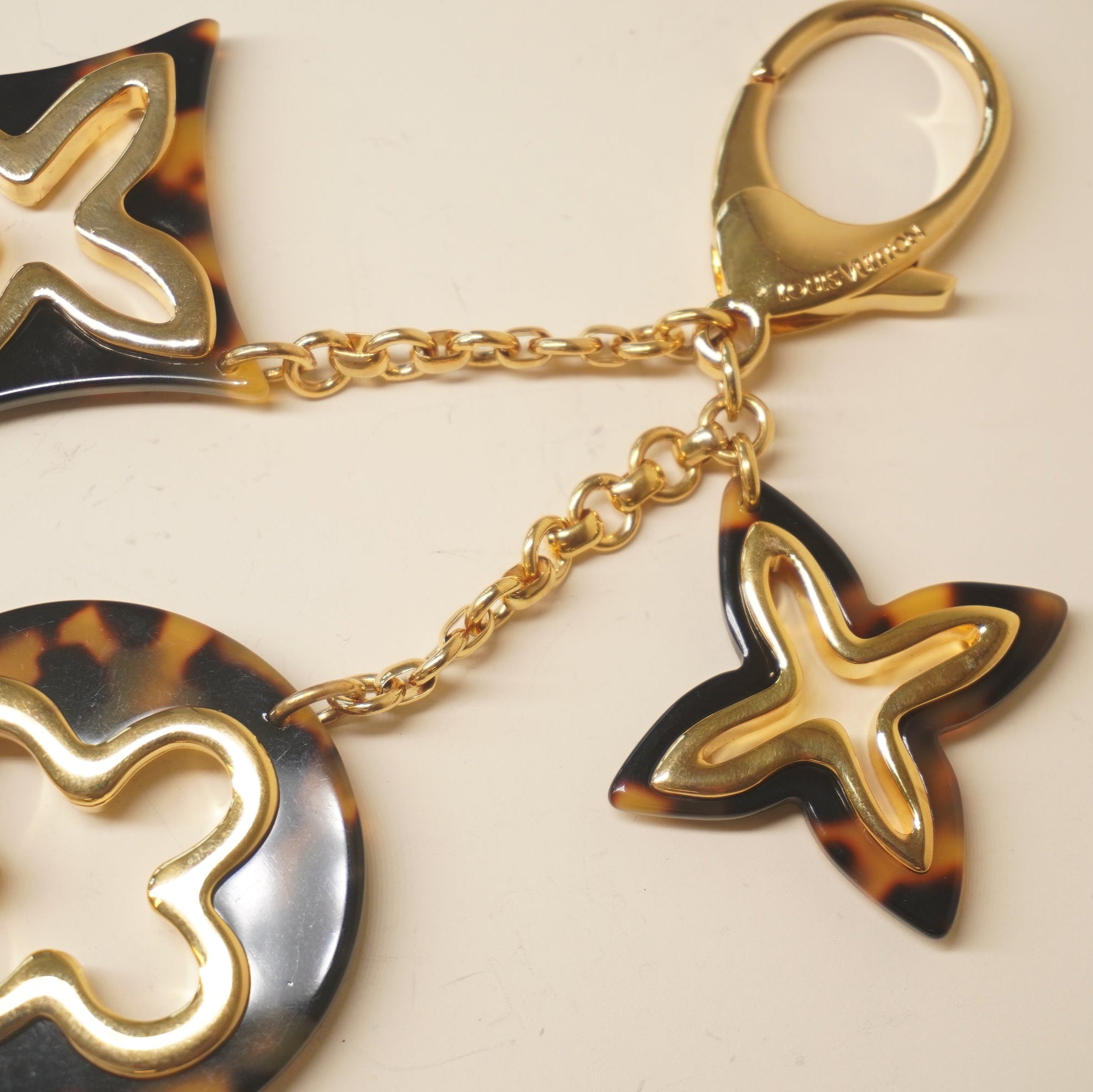 PRE-OWNED LV Insolence Bag Charm Ecaille