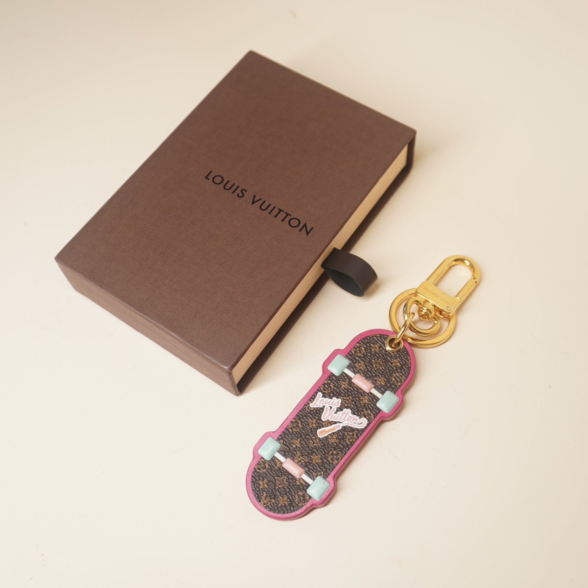 PRE-OWNED LV Monogram Skateboard Bag Charm Key Holder