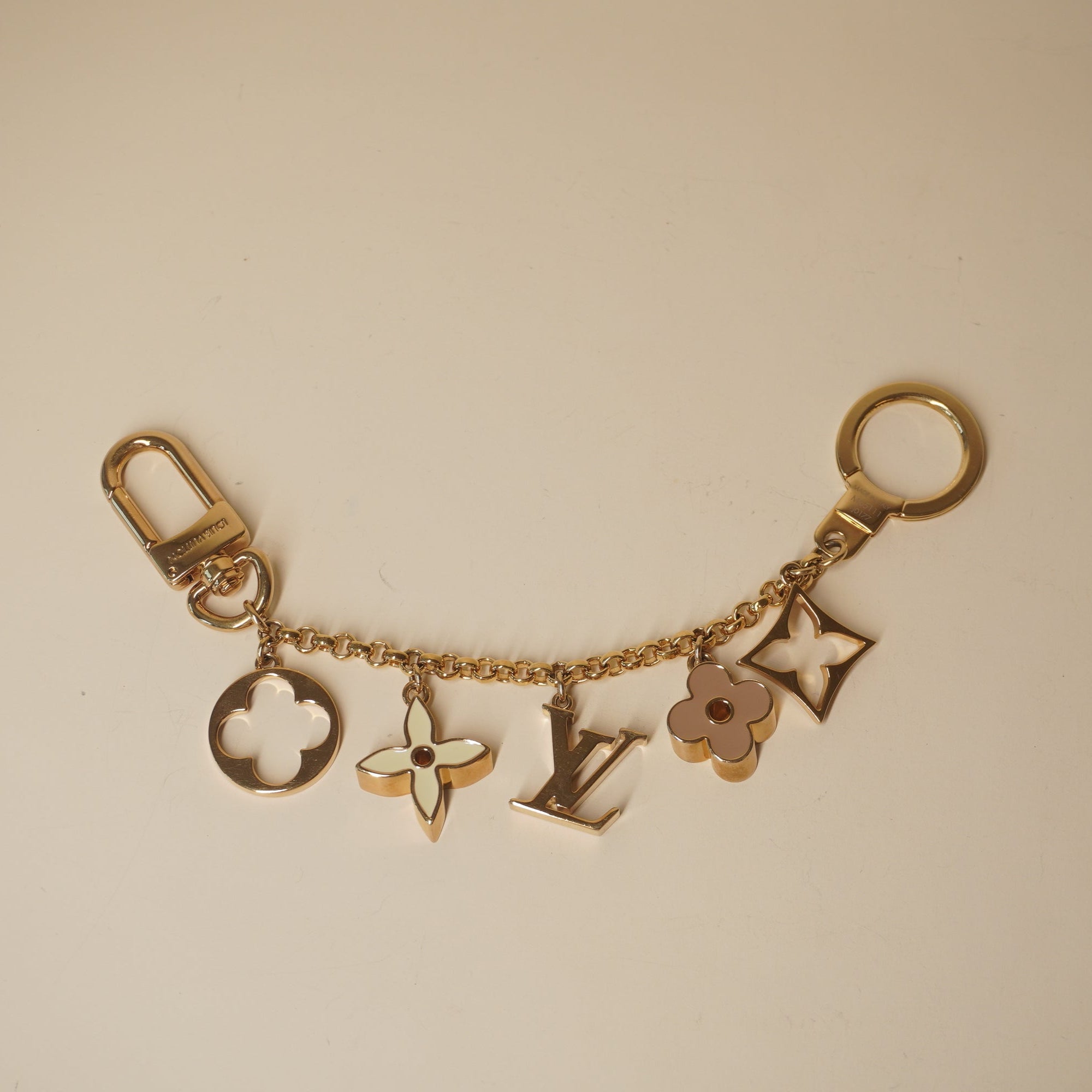 PRE-OWNED Brass Enamel Fleur De Monogram Bag Charm Chain