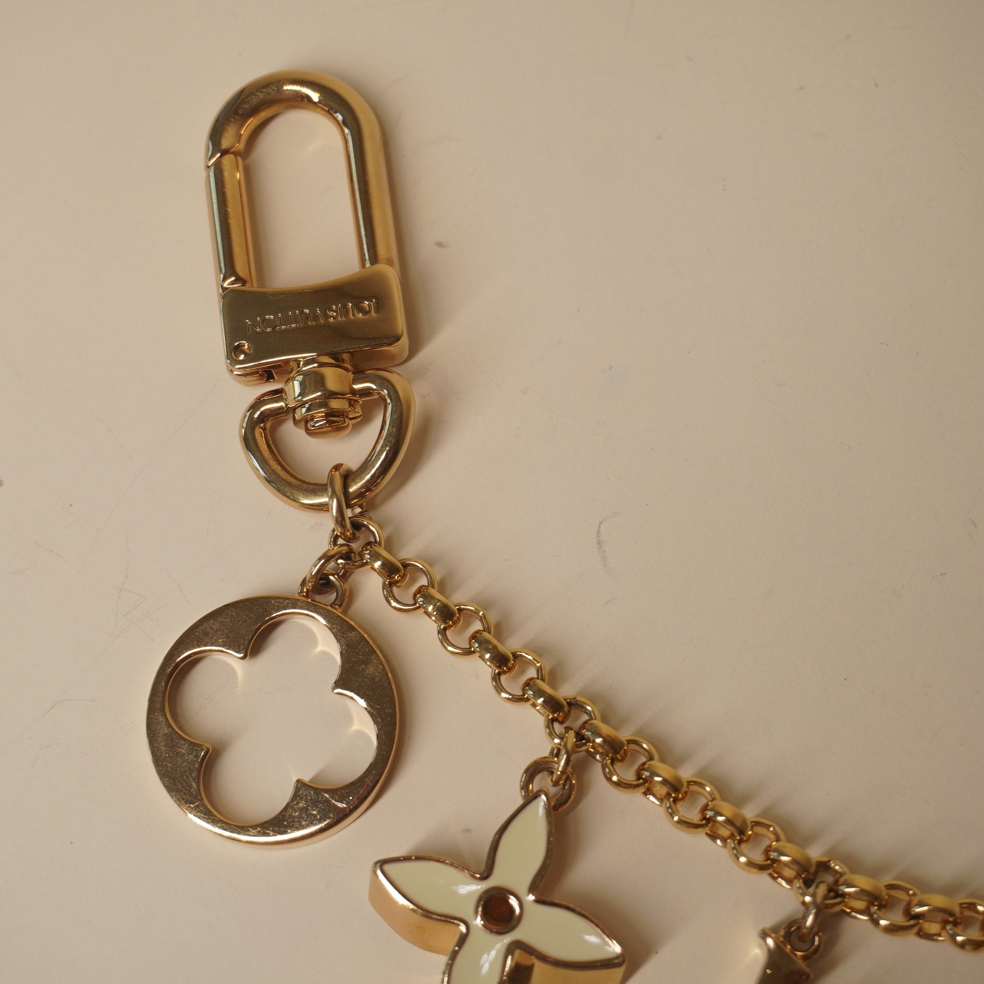 PRE-OWNED Brass Enamel Fleur De Monogram Bag Charm Chain