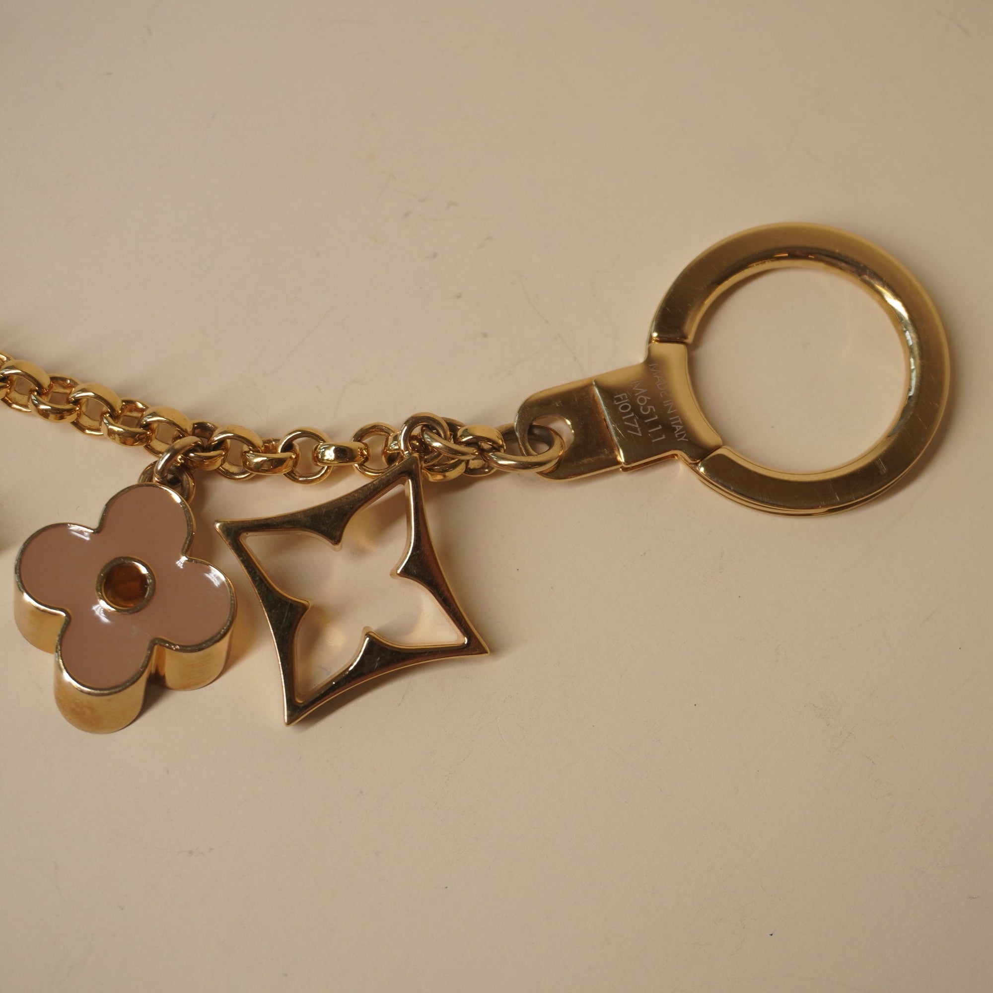 PRE-OWNED Brass Enamel Fleur De Monogram Bag Charm Chain