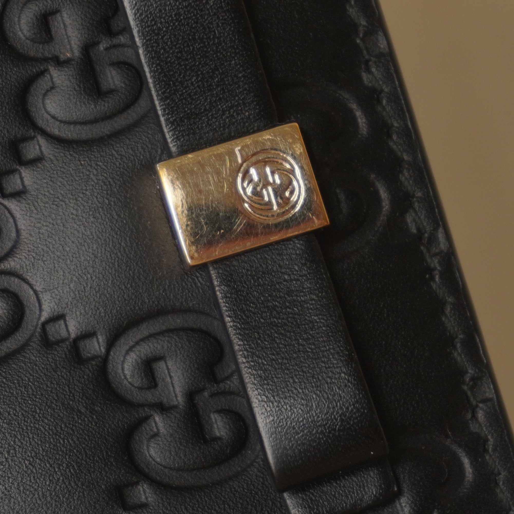 PRE-OWNED GG Black Guccissima Bow Bifold Wallet