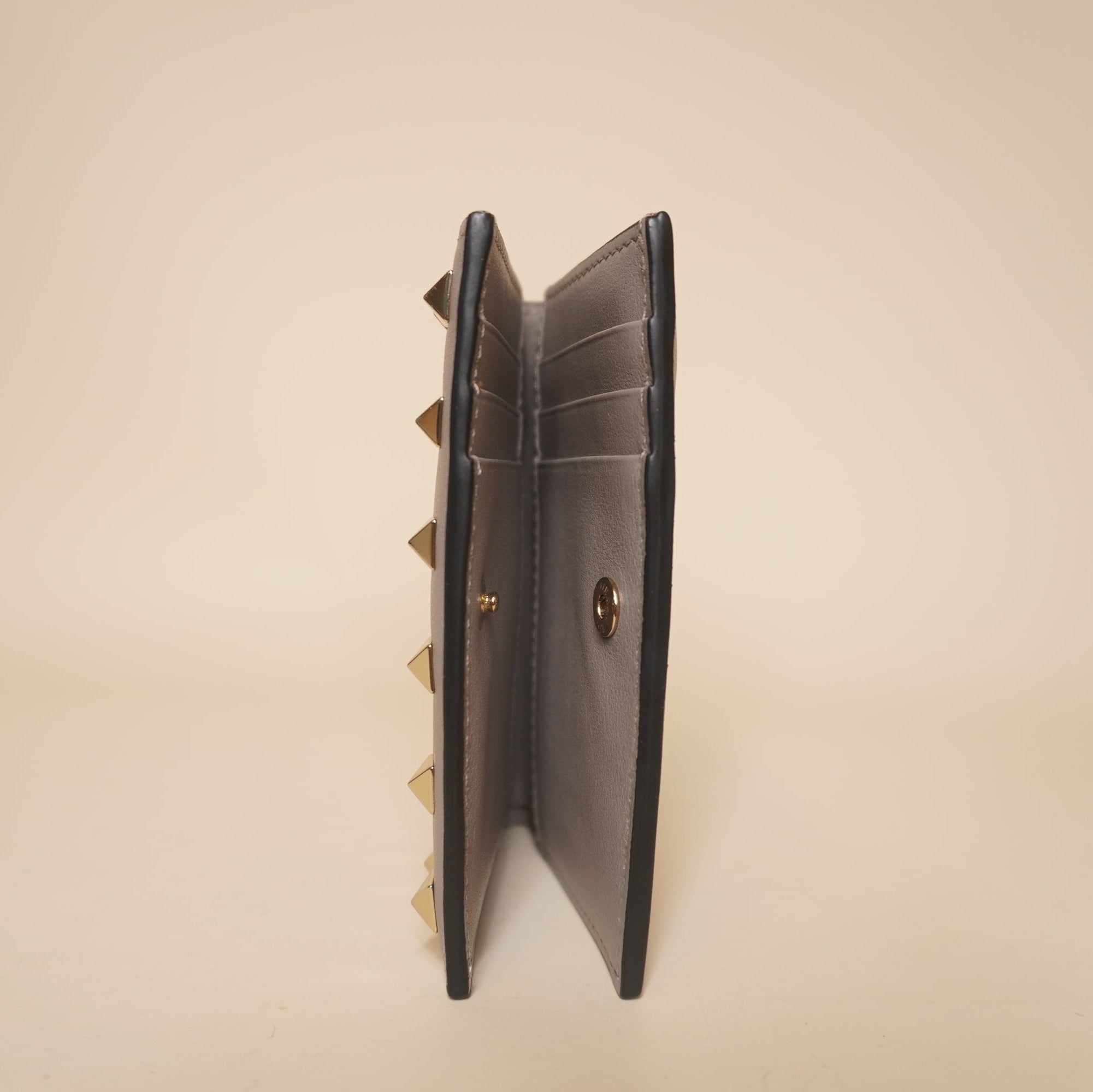 PRE-OWNED Calfskin Rockstud French Flap Wallet Poudre