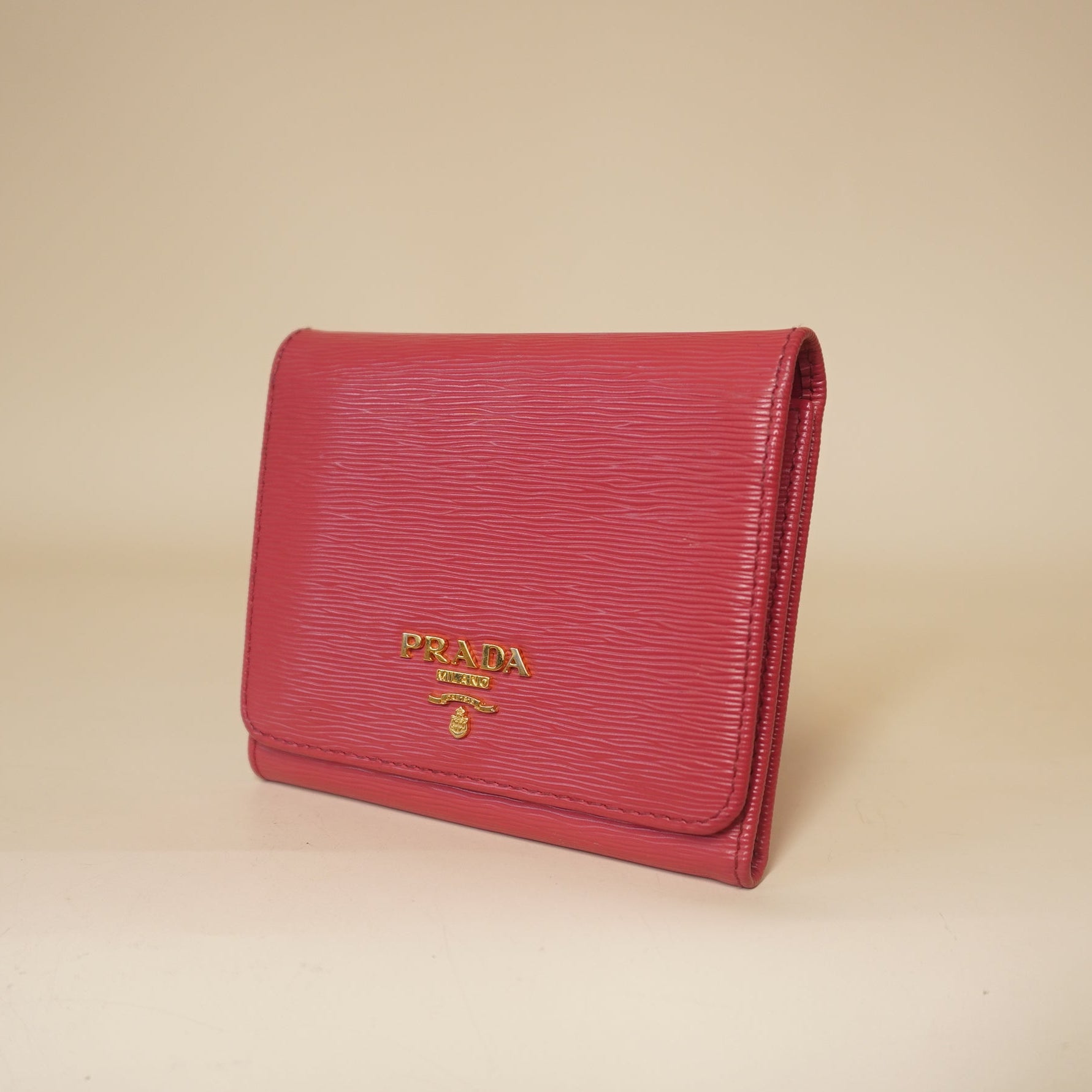 PRE-OWNED Pink Vitello Move Tri-Fold Compact Wallet Peonia