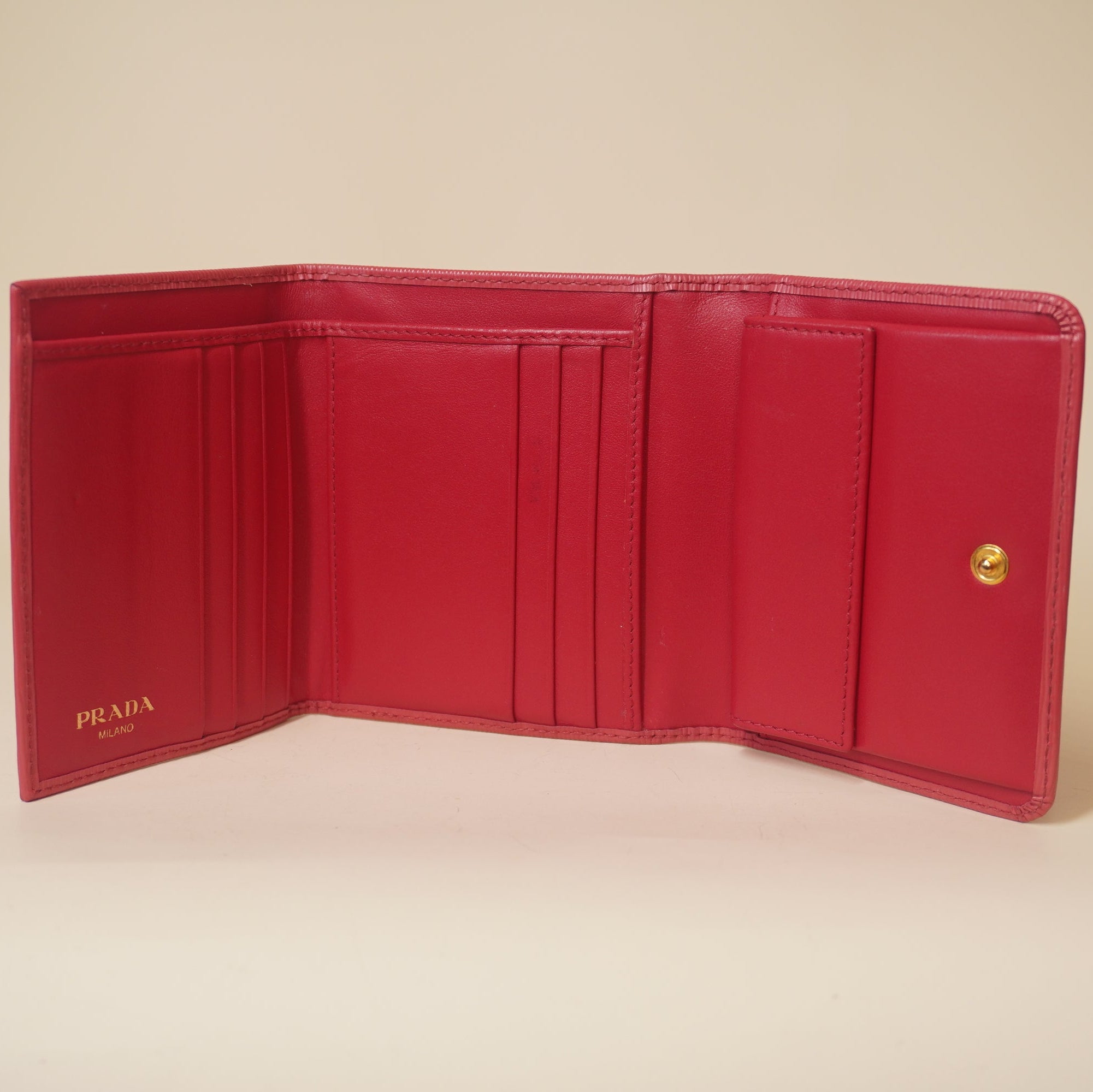 PRE-OWNED Pink Vitello Move Tri-Fold Compact Wallet Peonia