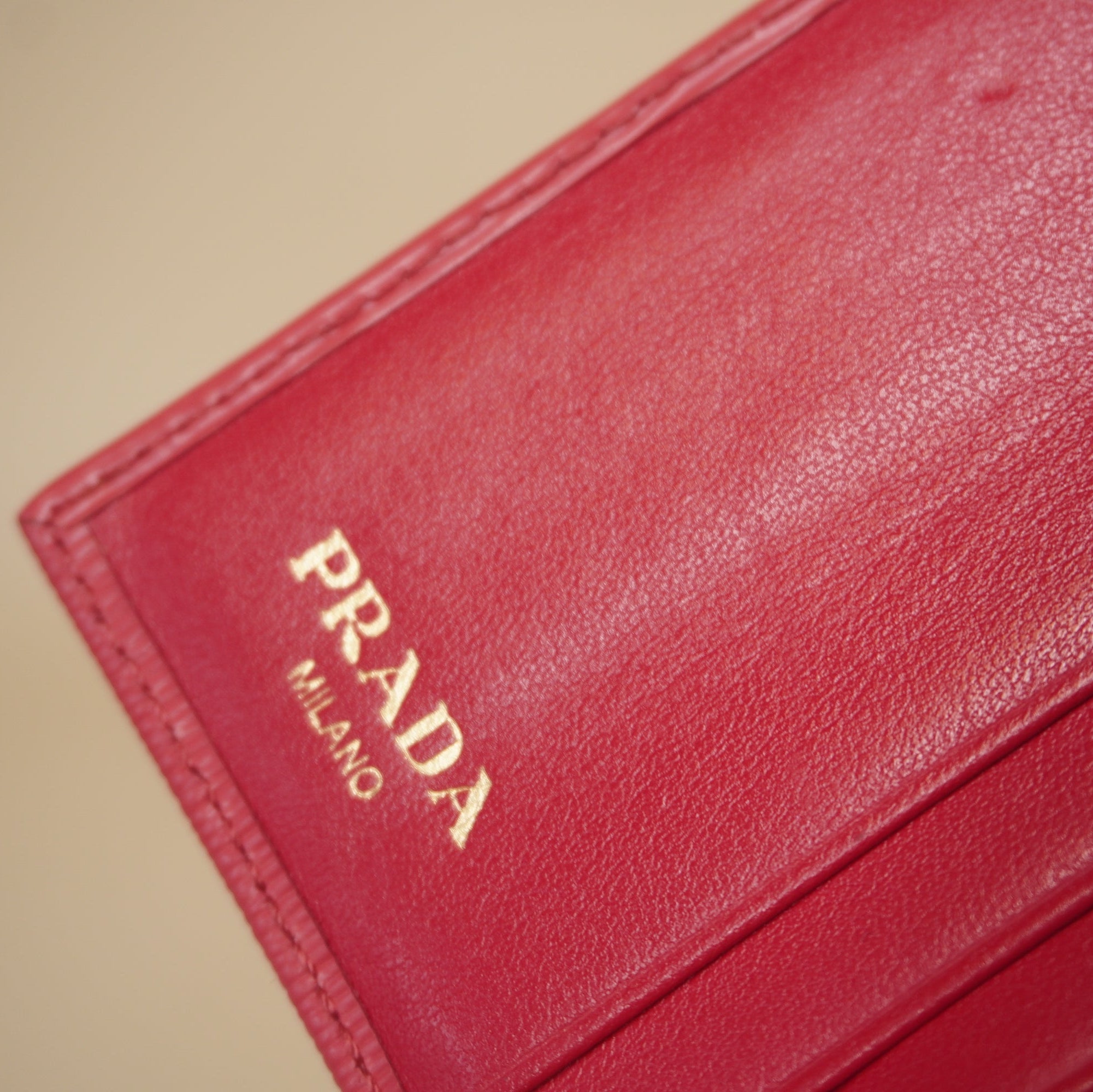 PRE-OWNED Pink Vitello Move Tri-Fold Compact Wallet Peonia