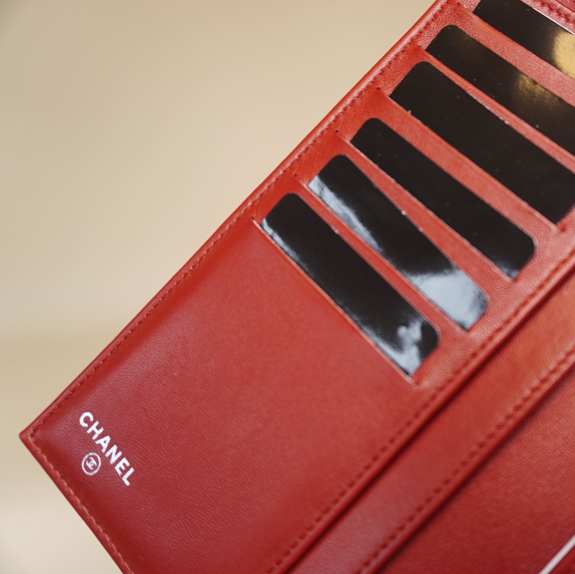 PRE-OWNED CC Red Lambskin Quilted Large Flap Wallet
