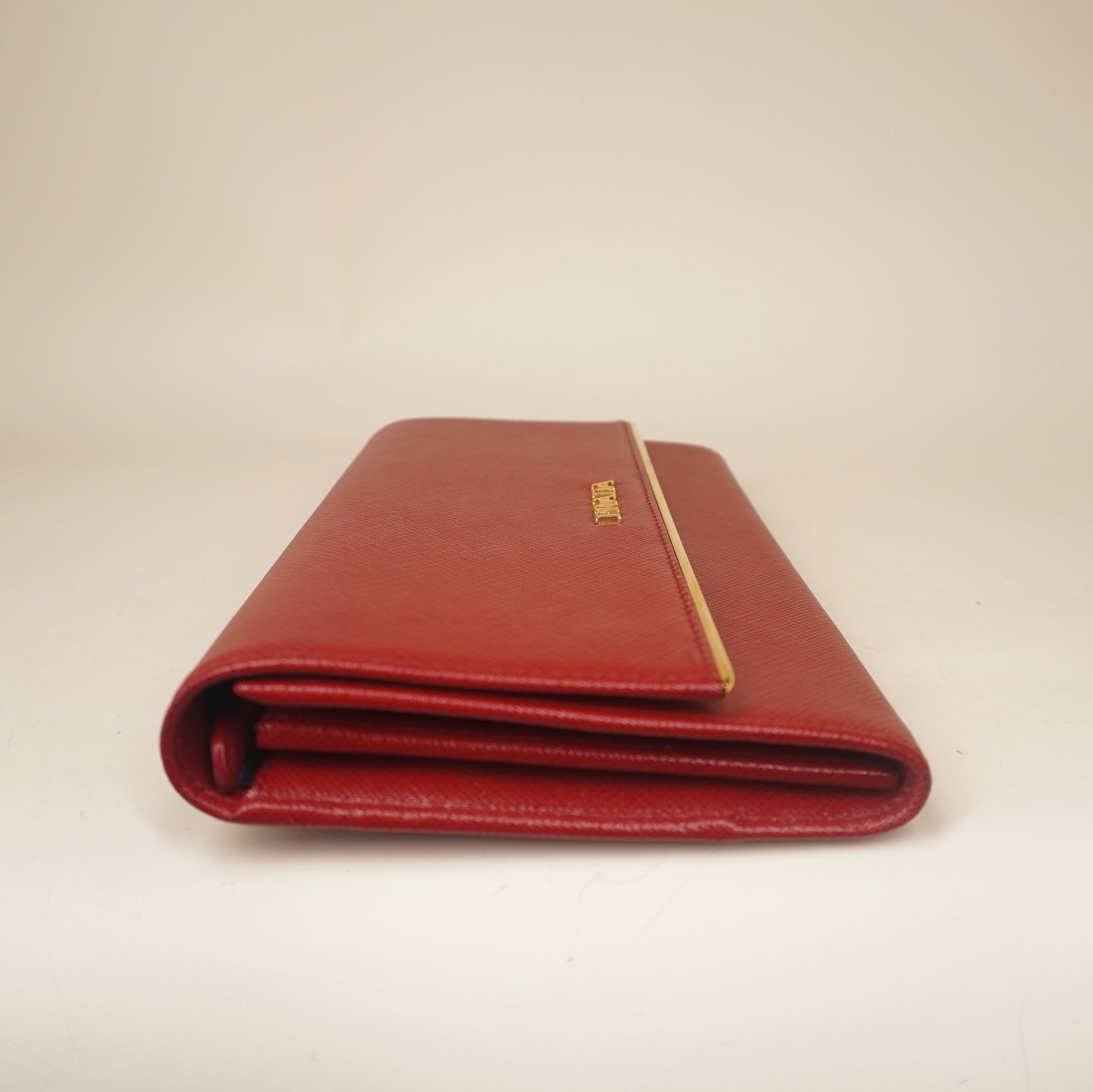 PRE-OWNED Red Saffiano Metal Bar Chain Wallet Fuoco