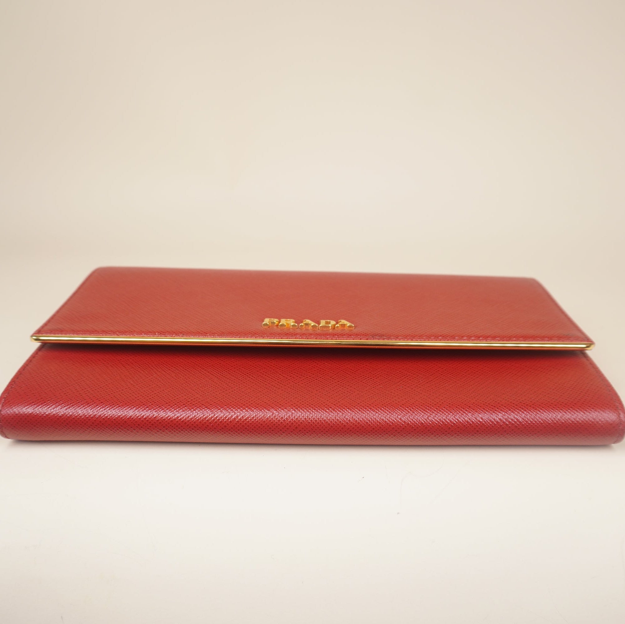 PRE-OWNED Red Saffiano Metal Bar Chain Wallet Fuoco