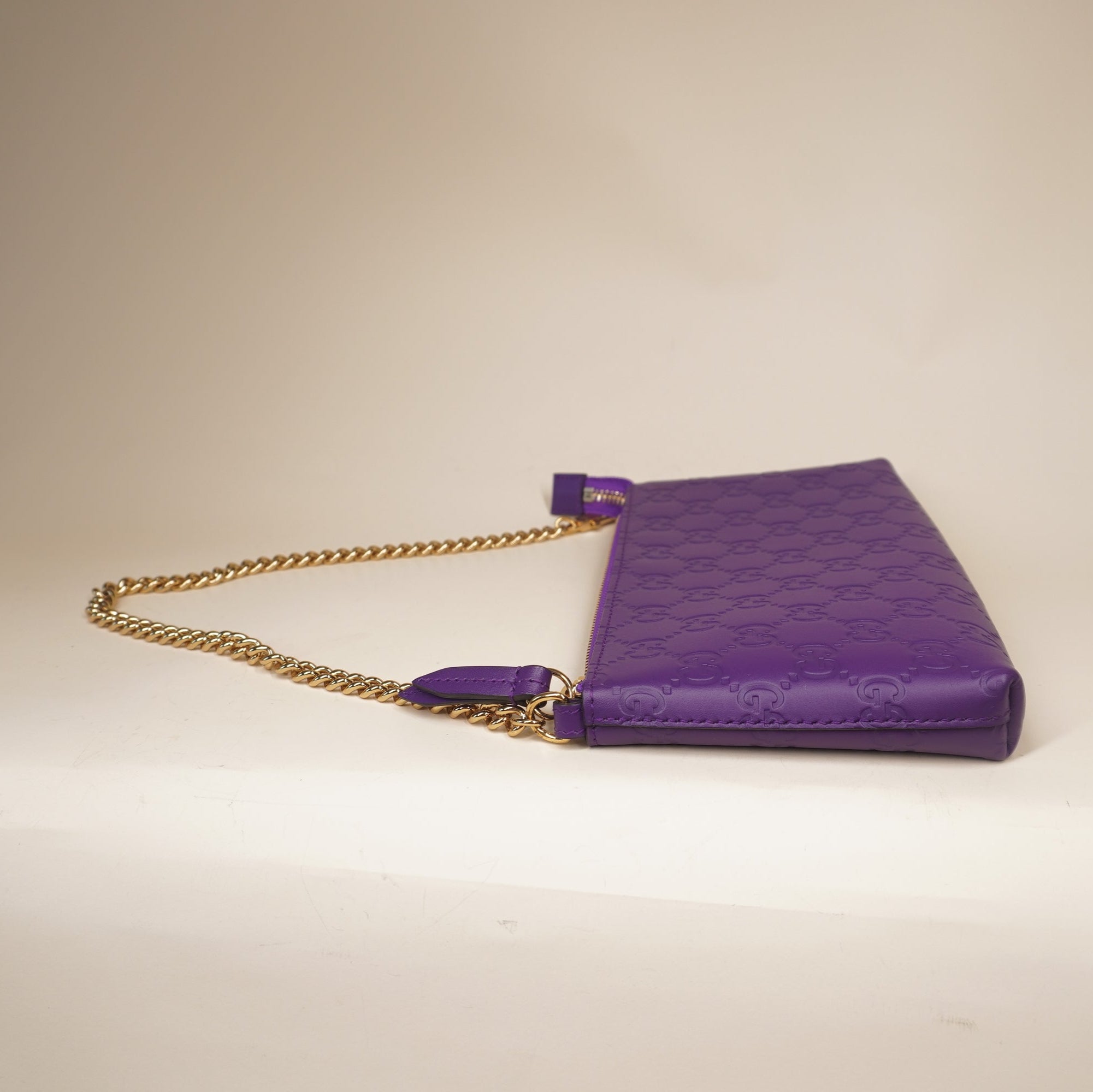PRE-OWNED GG Purple Chain Wristlet Wallet Guccissima Leather