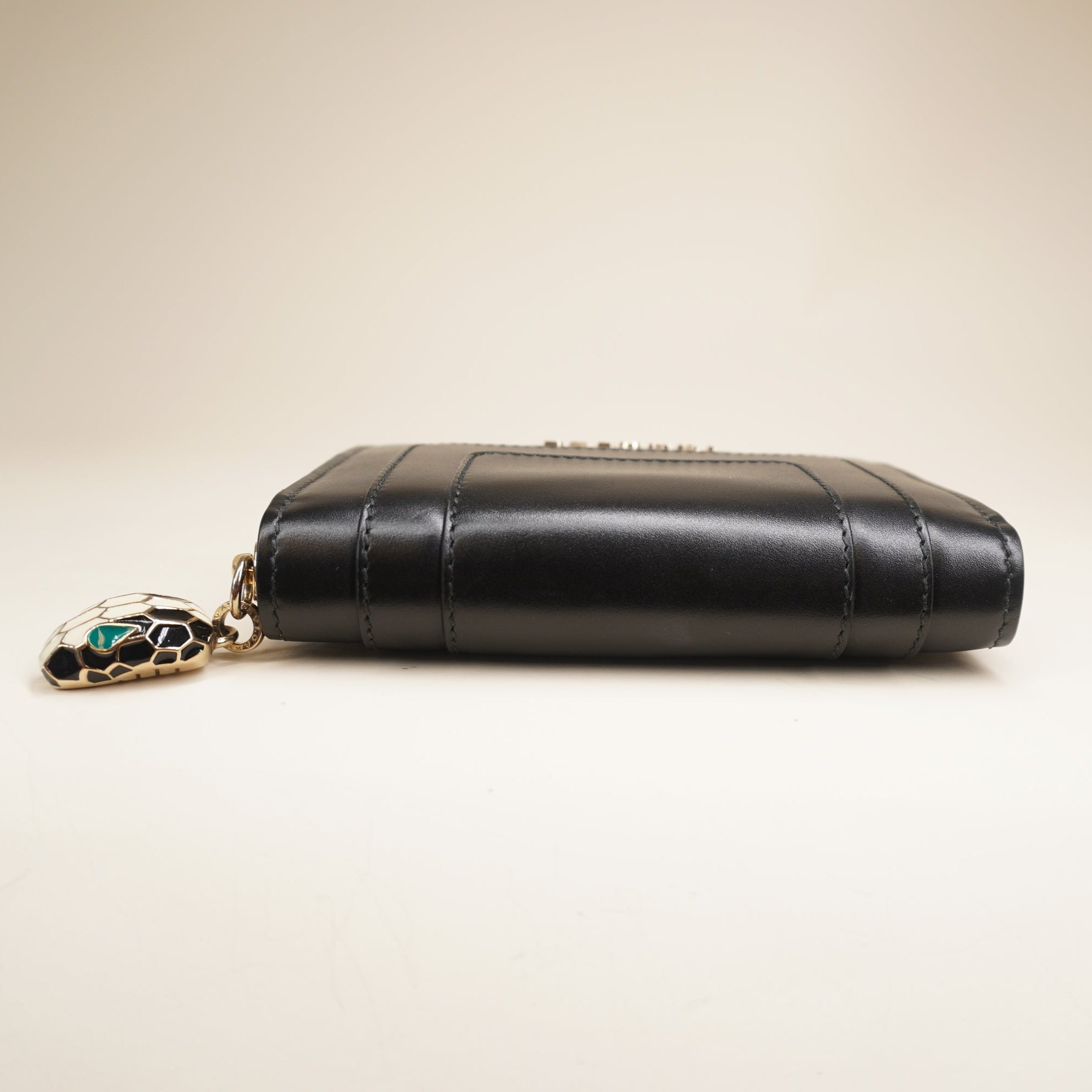 PRE-OWNED Black Calfskin Serpenti Zip Around Wallet