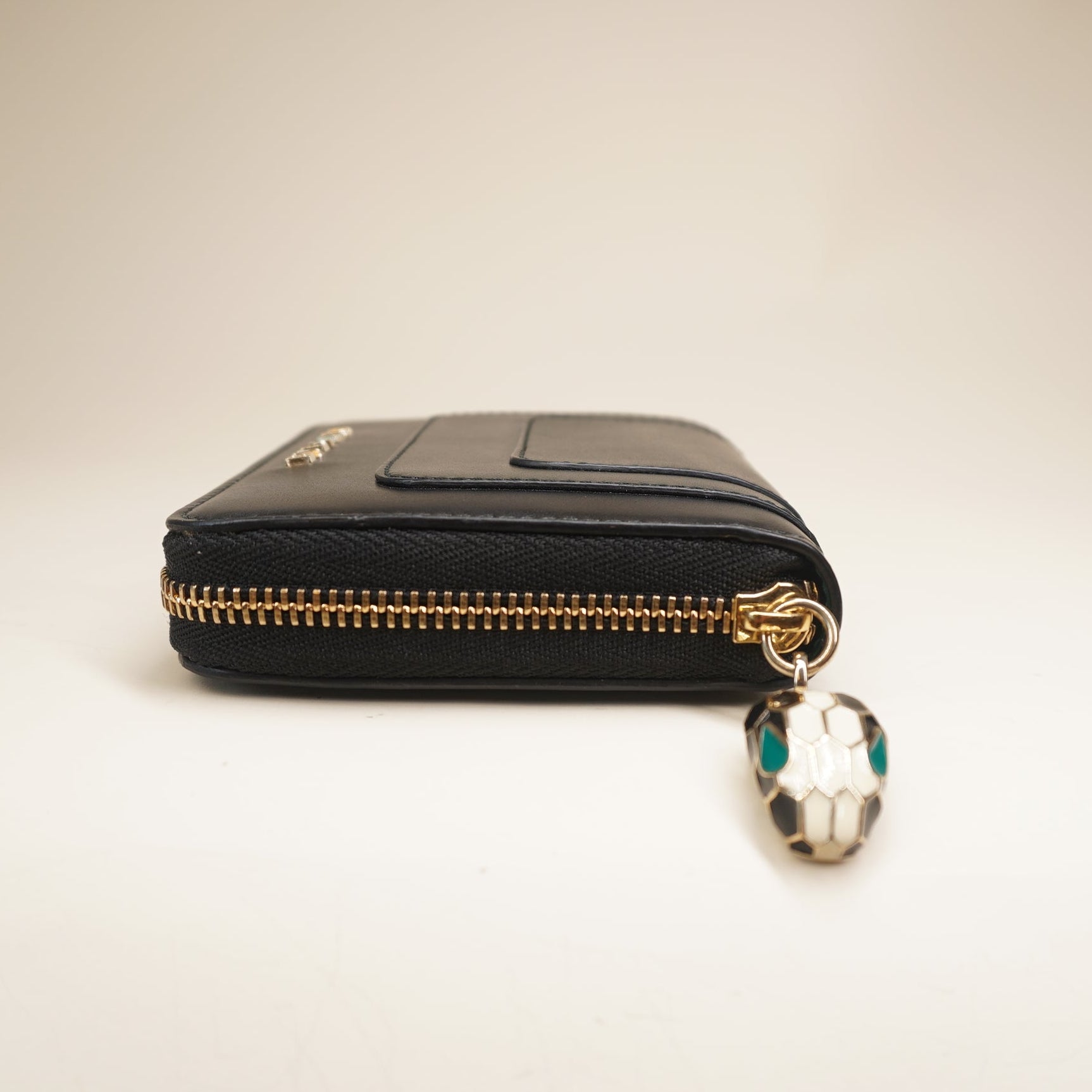 PRE-OWNED Black Calfskin Serpenti Zip Around Wallet