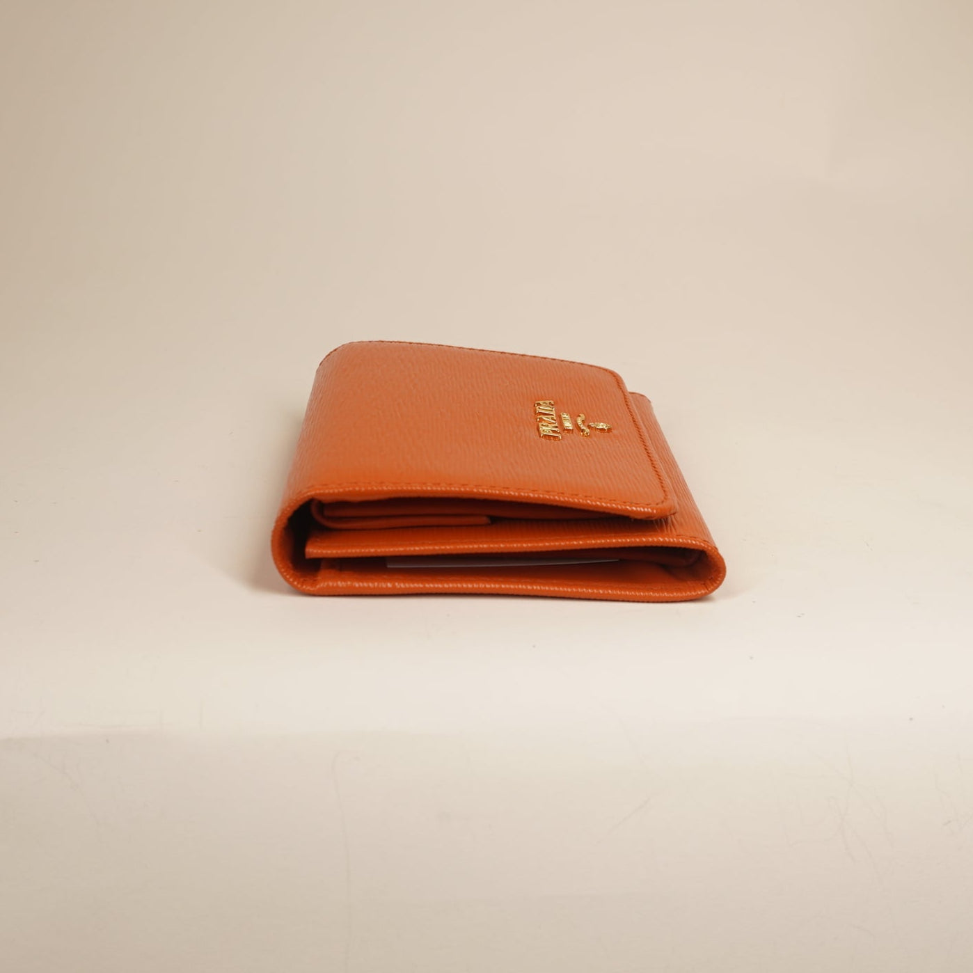 PRE-OWNED Vitello Move Bifold Wallet Papaya