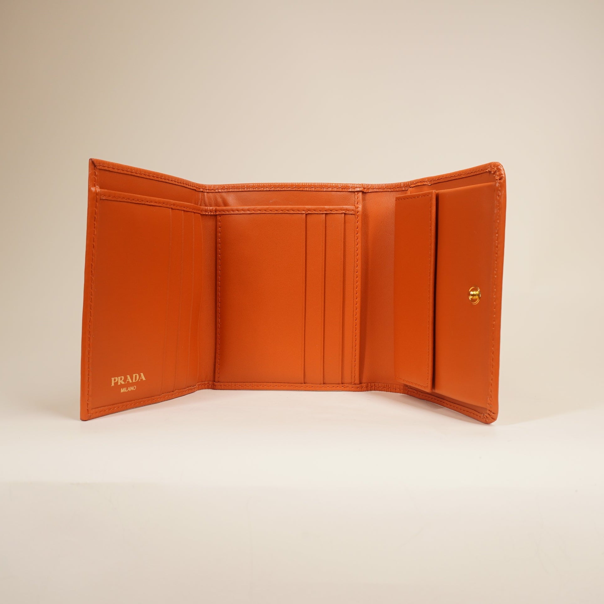 PRE-OWNED Vitello Move Bifold Wallet Papaya
