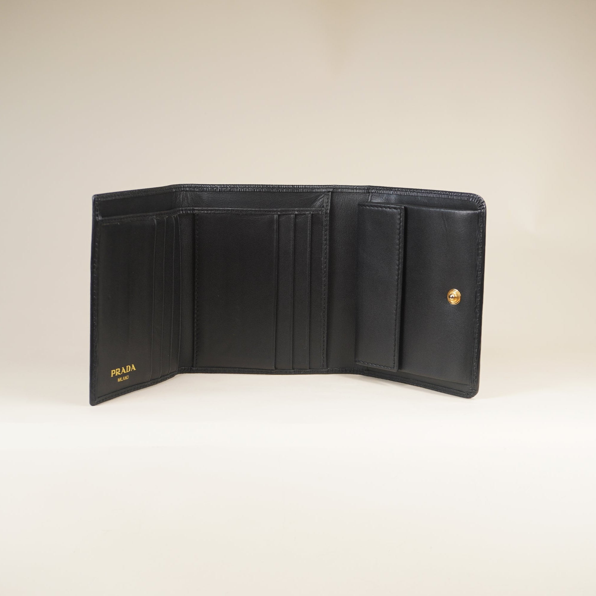 PRE-OWNED Vitello Move Bi-Fold Wallet Black