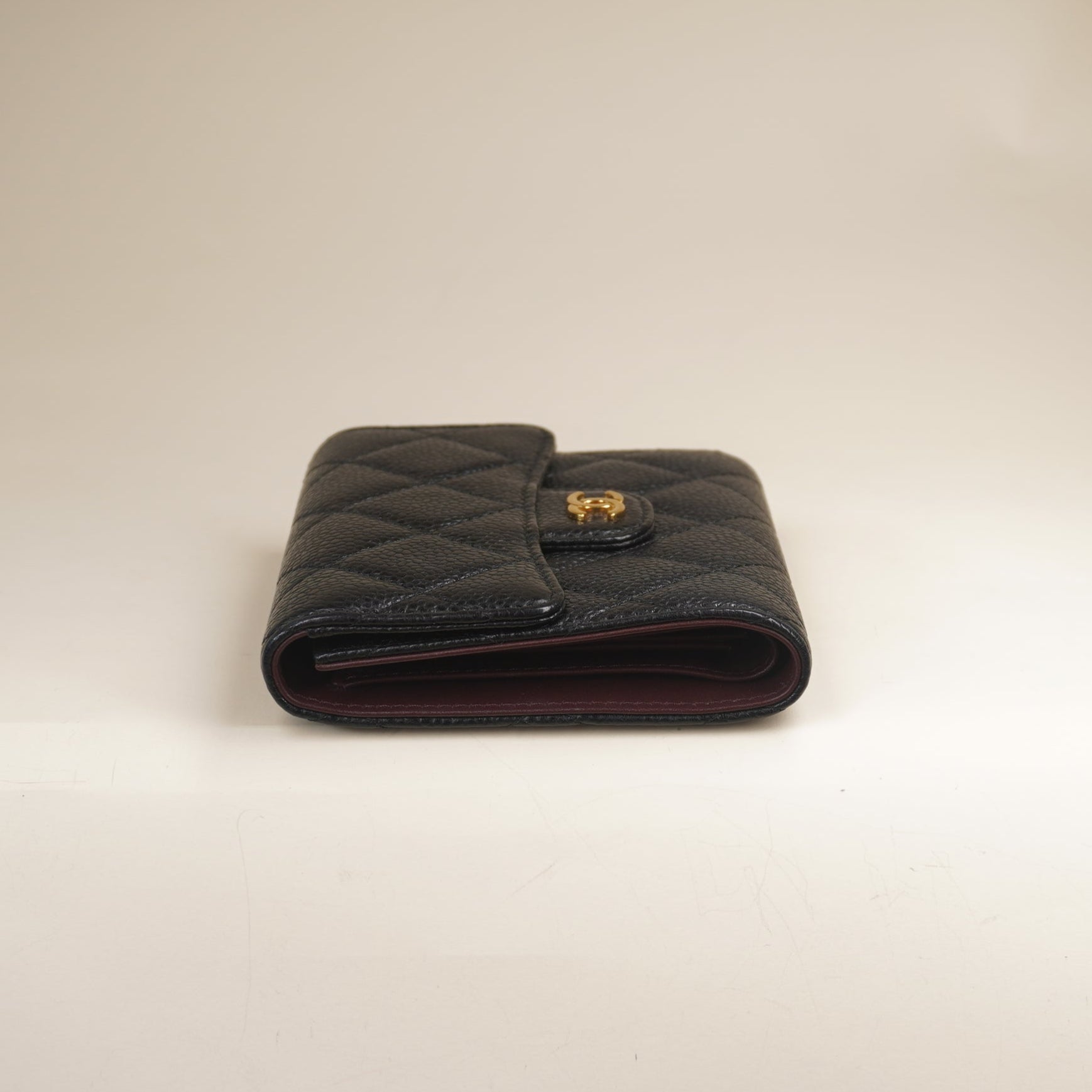 PRE-OWNED CC Black Caviar Quilted Compact Flap Wallet