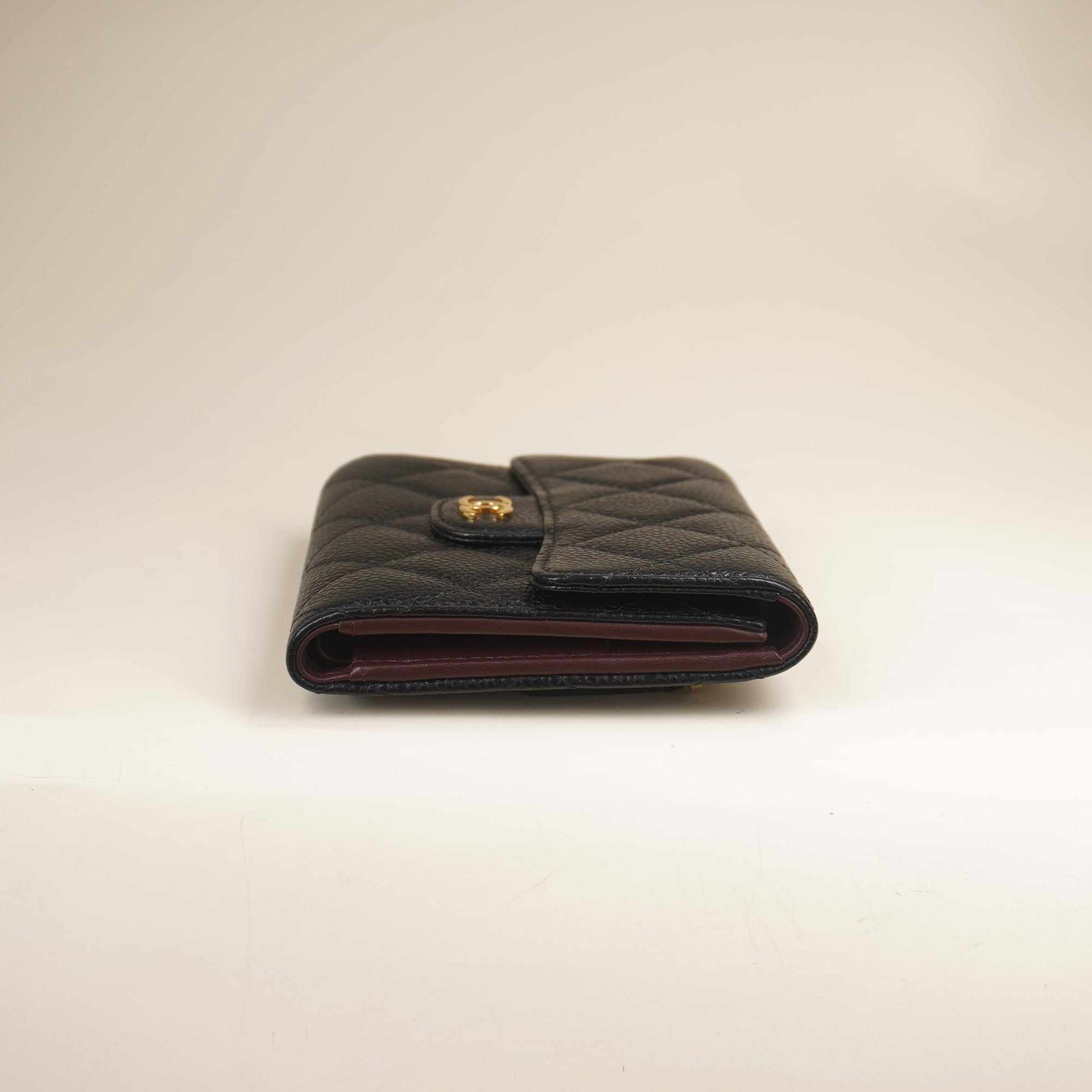 PRE-OWNED CC Black Caviar Quilted Compact Flap Wallet