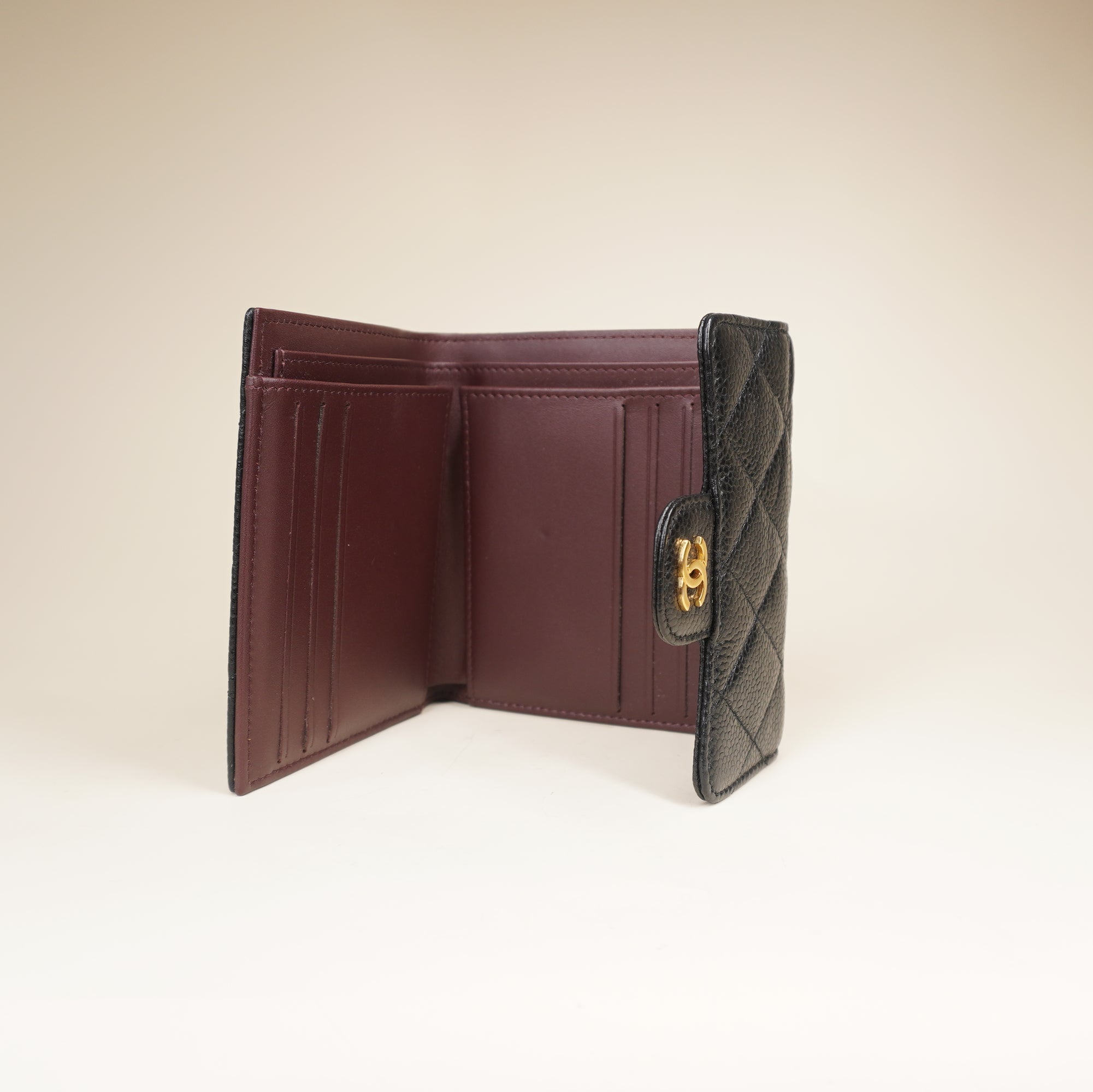 PRE-OWNED CC Black Caviar Quilted Compact Flap Wallet
