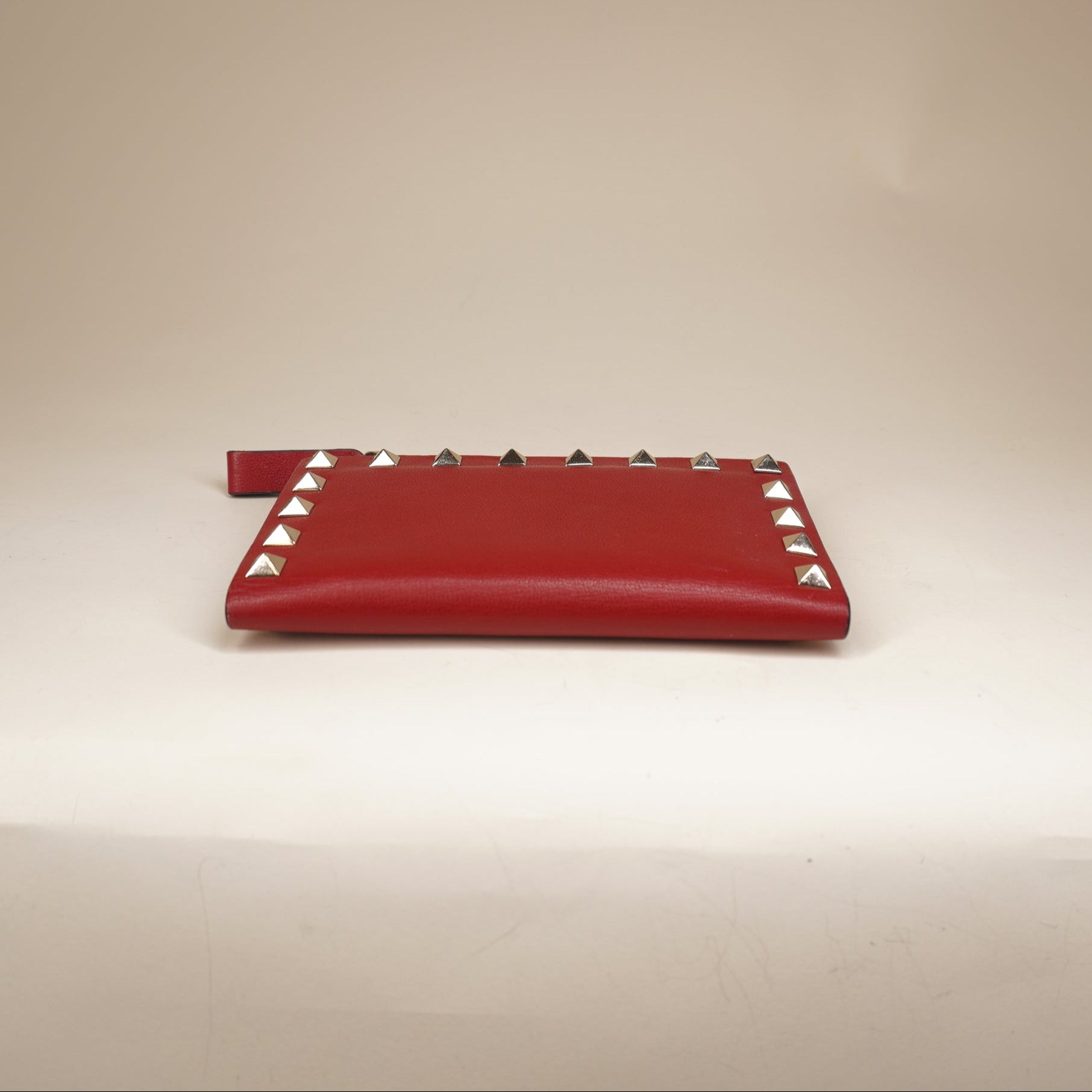 PRE-OWNED Rockstud Grained Calfskin Red Short Wallet