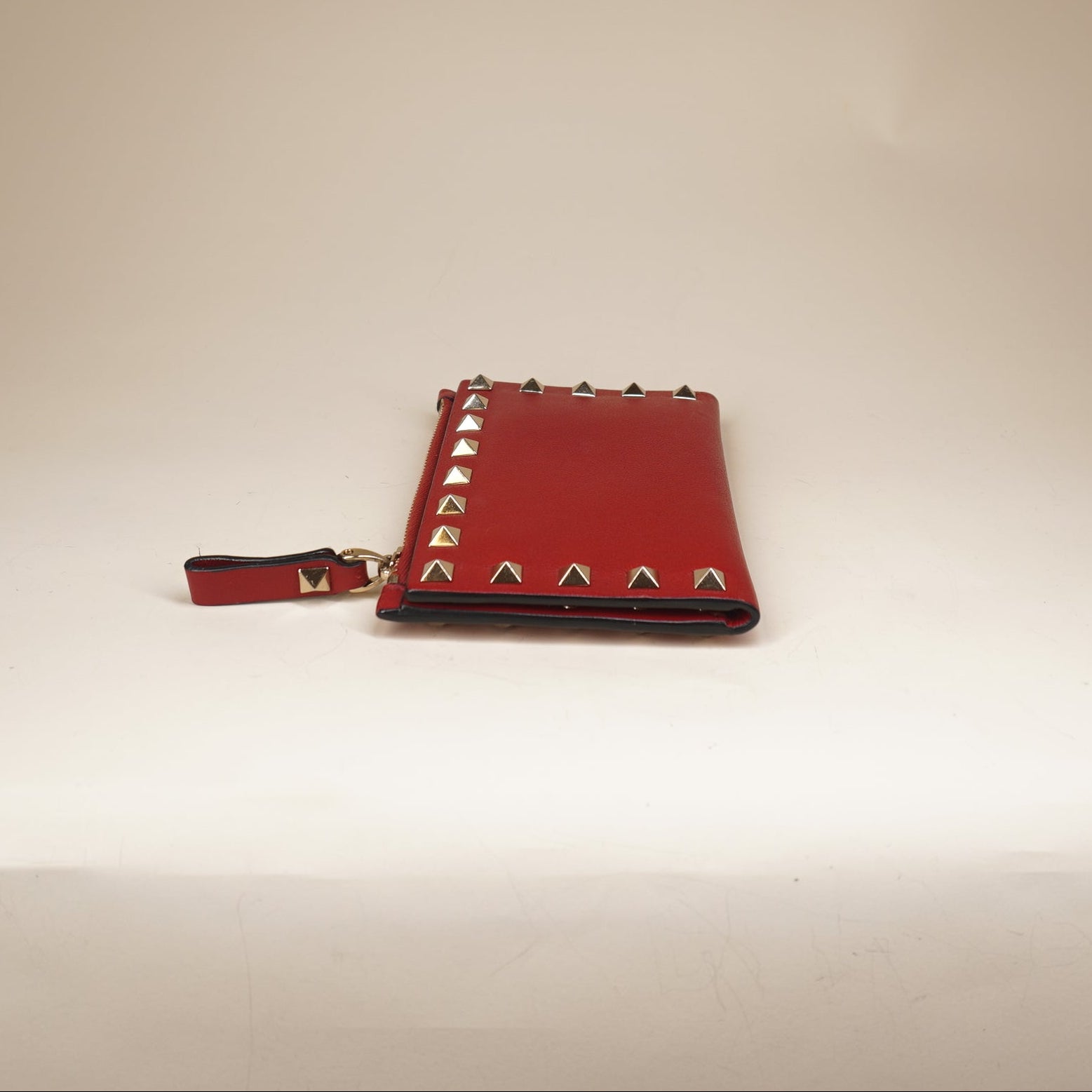 PRE-OWNED Rockstud Grained Calfskin Red Short Wallet