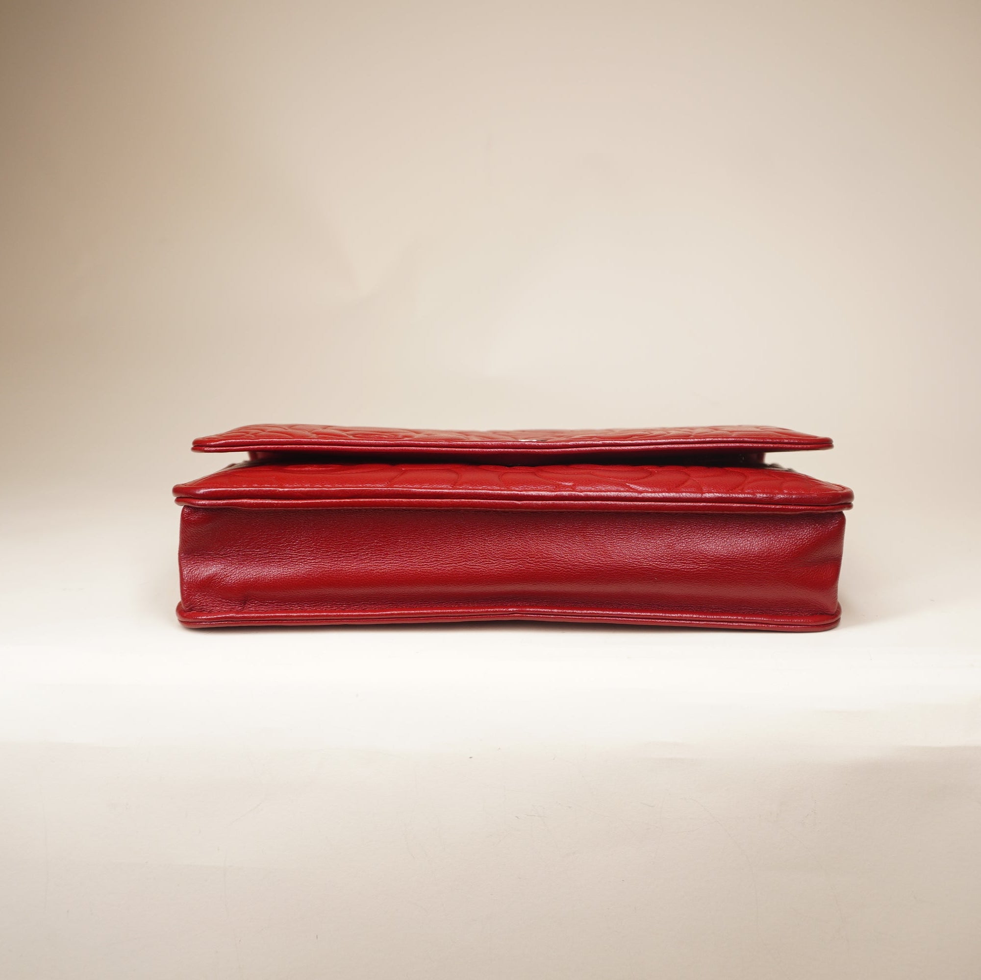 PRE-OWNED CC Red Lambskin Camellia Embossed Wallet on Chain