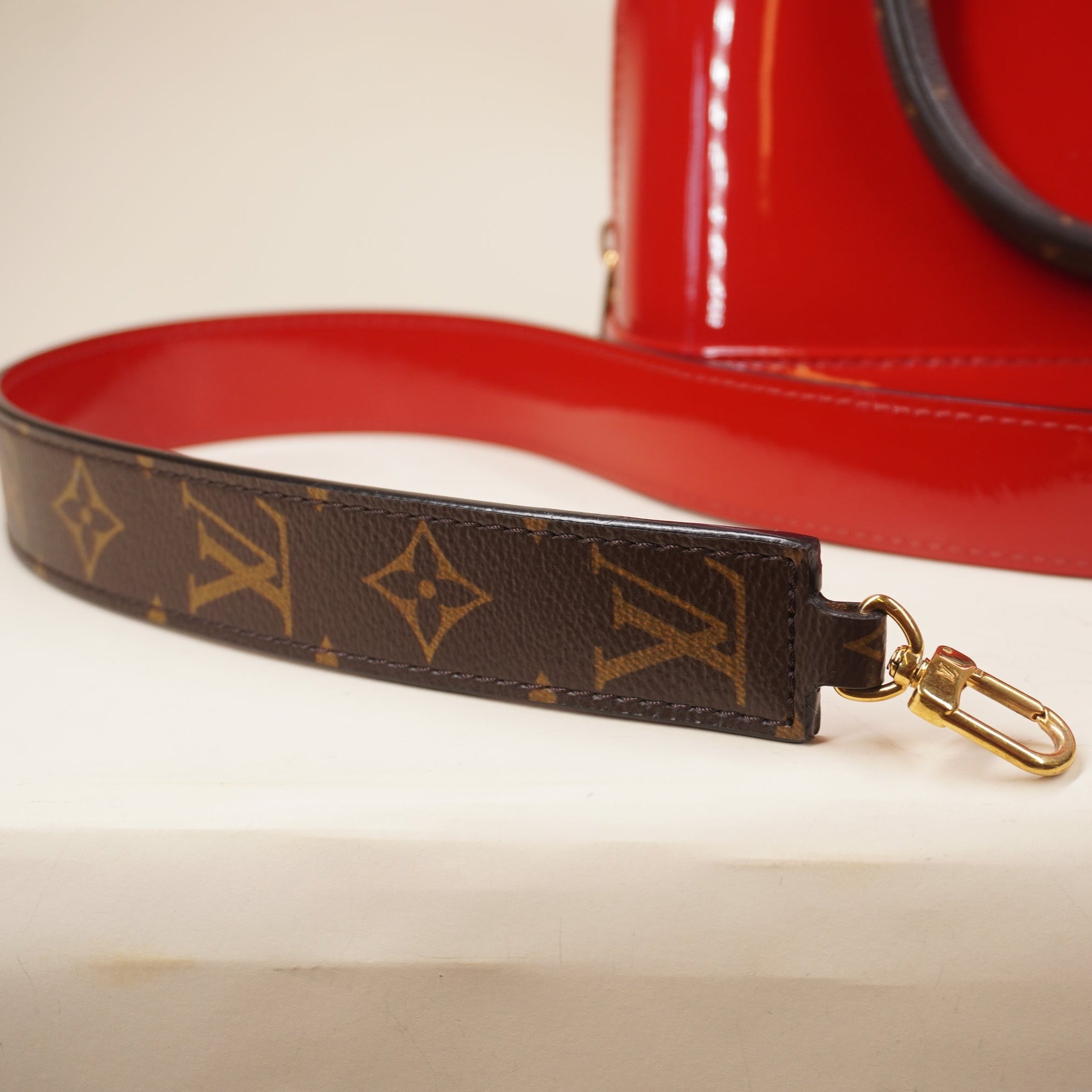 PRE-OWEND LV Scarlet Vernis Monogram Alma BB Shoulder Bag