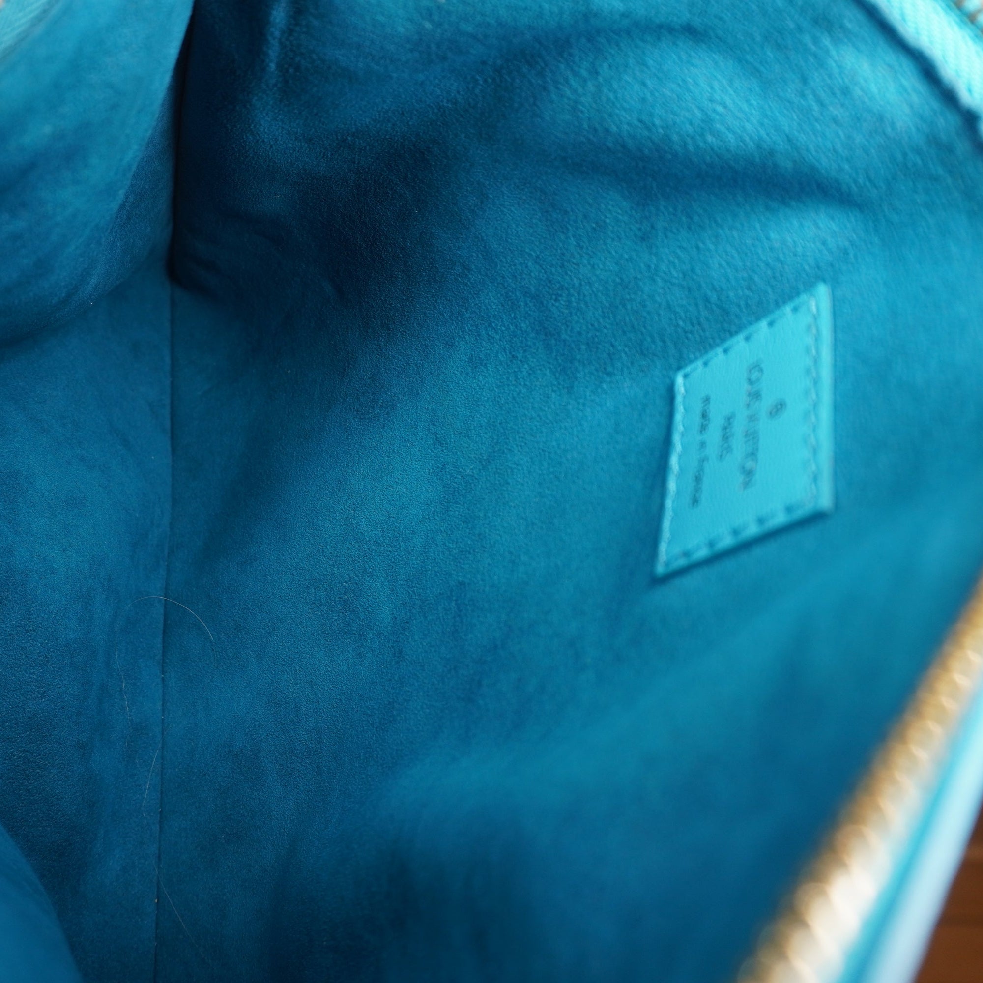 PRE-OWNED Lambskin Embossed Monogram Coussin PM Blue
