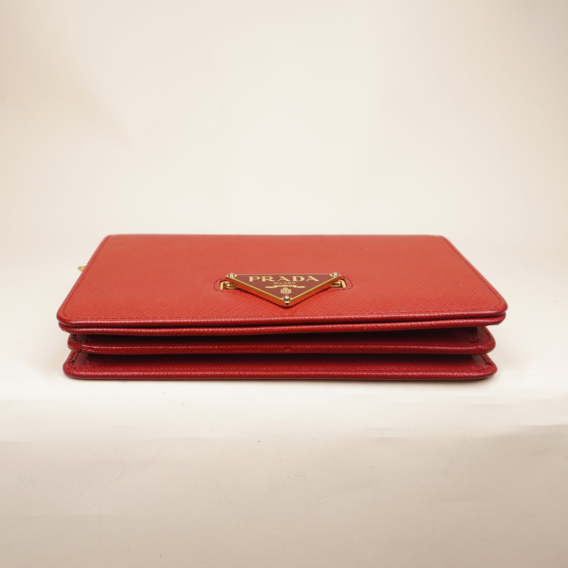 PRE-OWNED Red Saffiano Bandoliera Flip Lock Chain Crossbody Bag