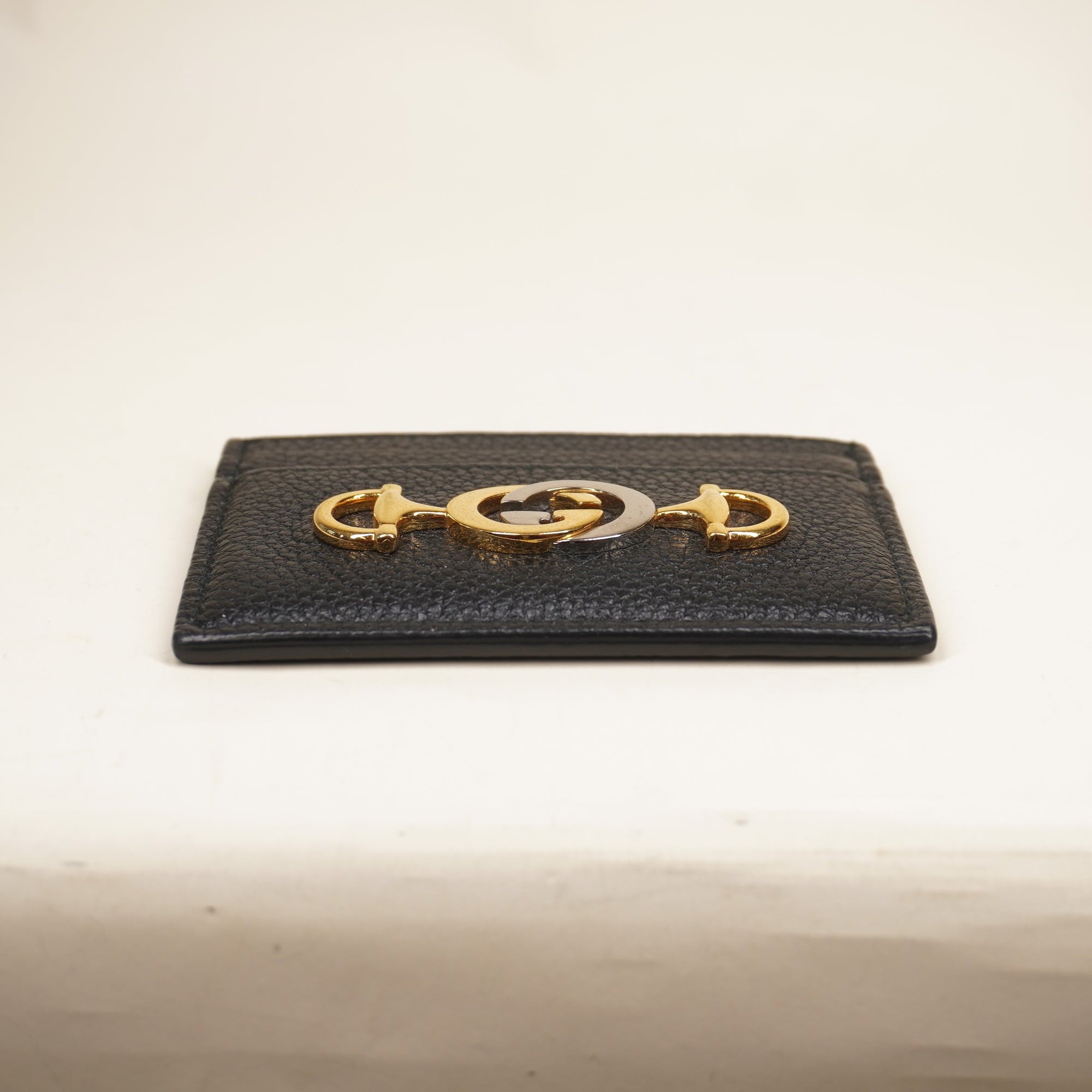 PRE-OWNED Grainy Calfskin Zumi Card Holder Black